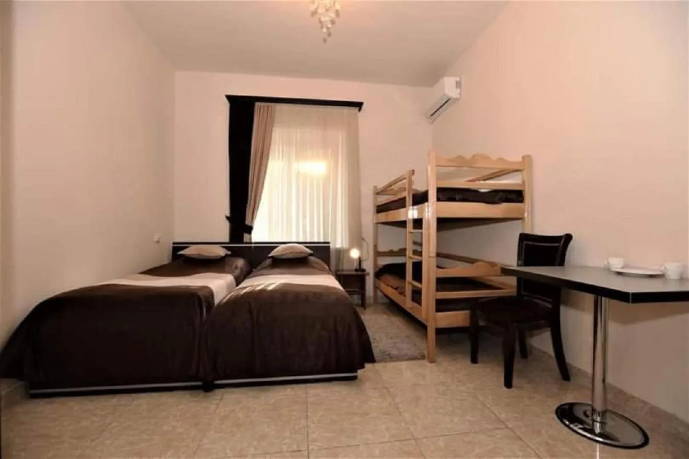 Bed in Comfort House Hotel