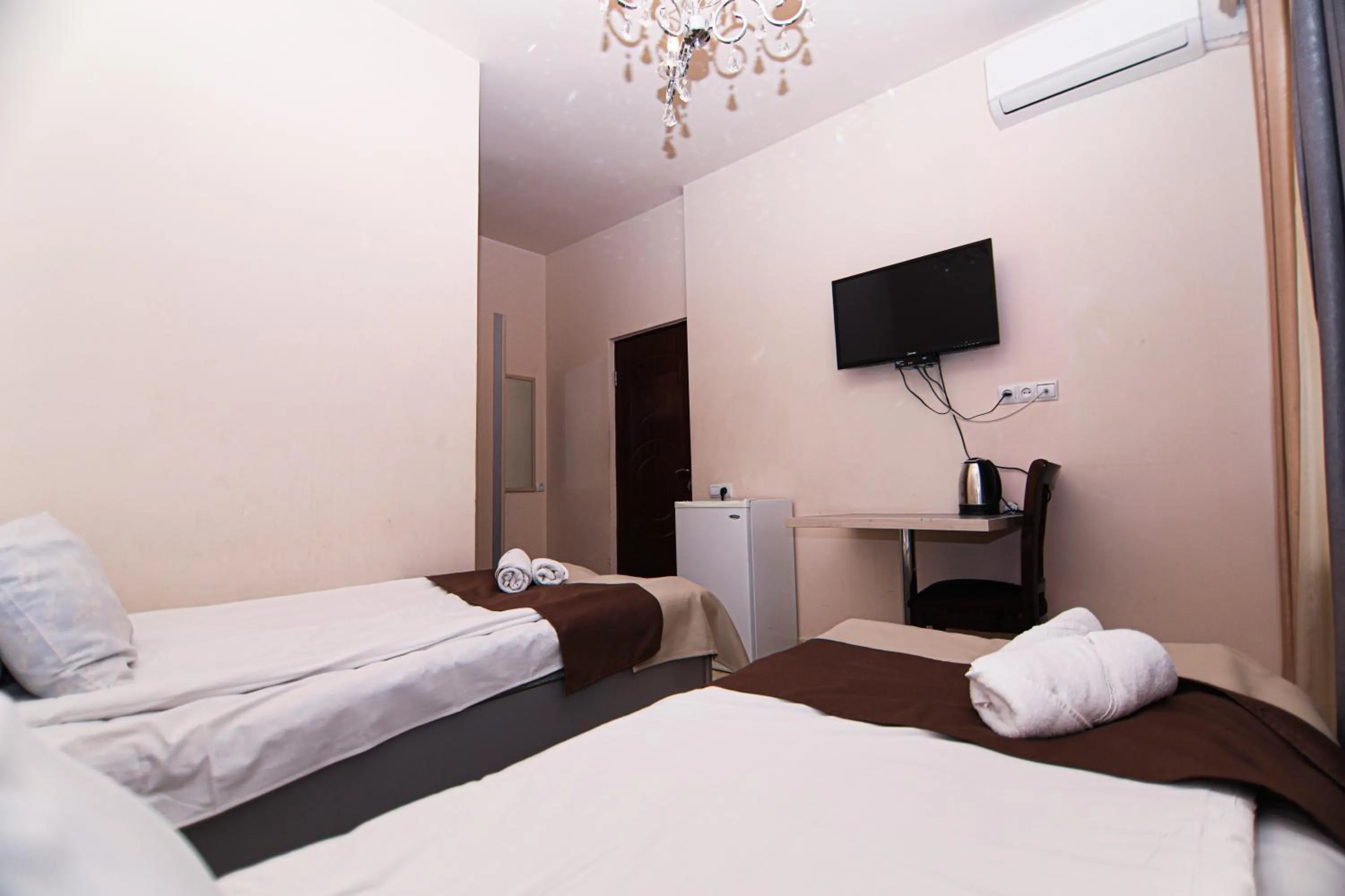 Bed in Comfort House Hotel