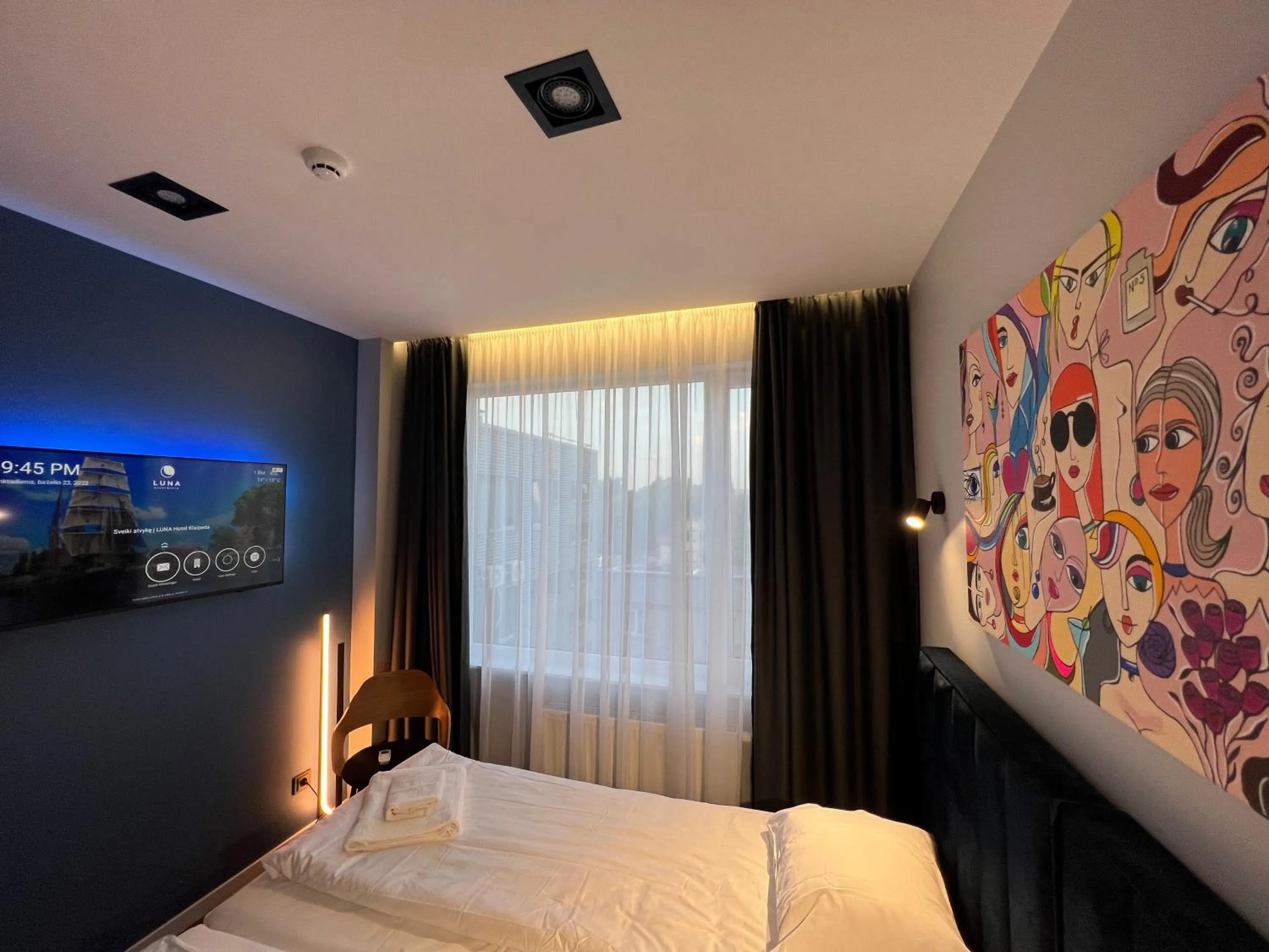 Photo of the whole room, Bed in Luna Self Check-in Hotel Klaipeda