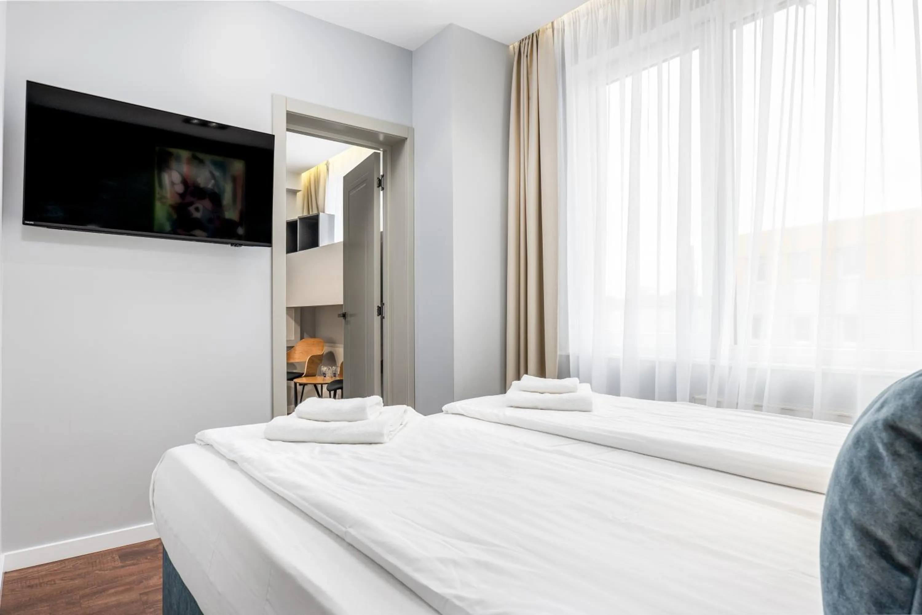 Bed in Luna Self Check-in Hotel Klaipeda