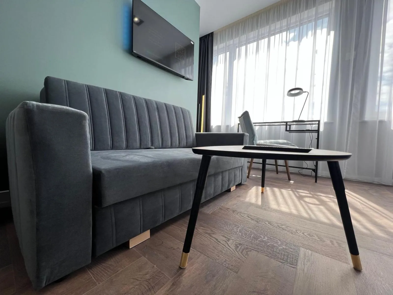 TV and multimedia in Luna Self Check-in Hotel Klaipeda