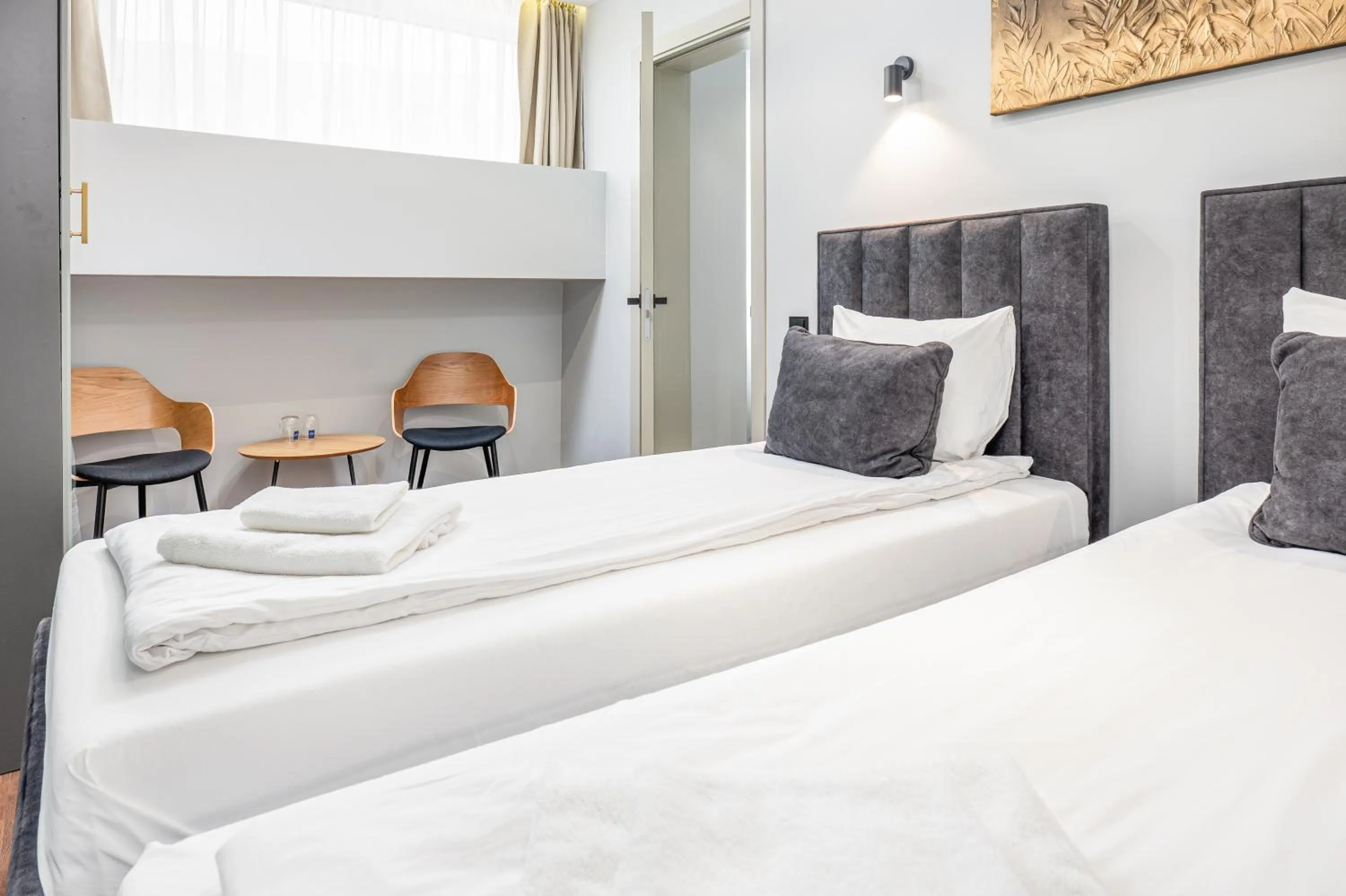 Bed in Luna Self Check-in Hotel Klaipeda