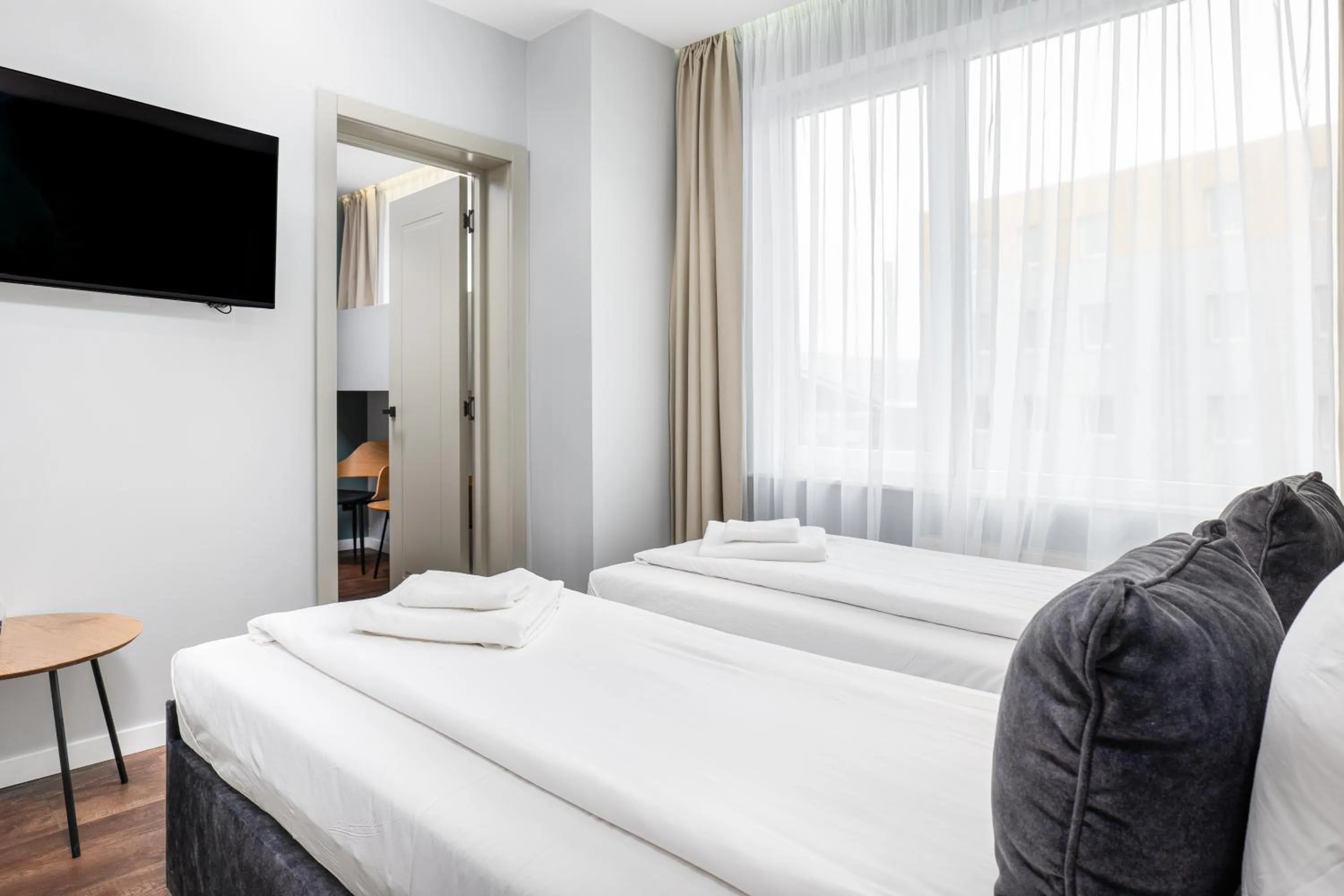 Bed in Luna Self Check-in Hotel Klaipeda