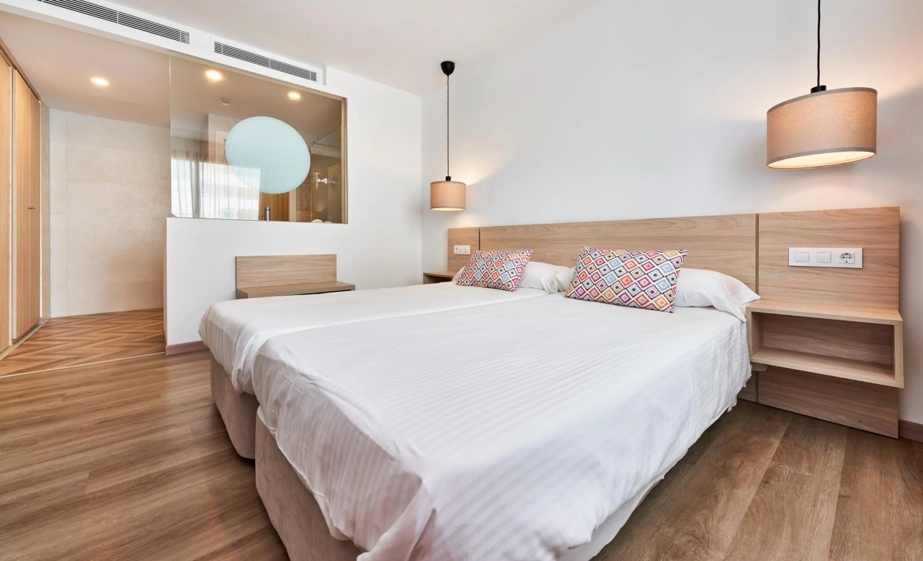 Bed in Apartamentos Sinfony