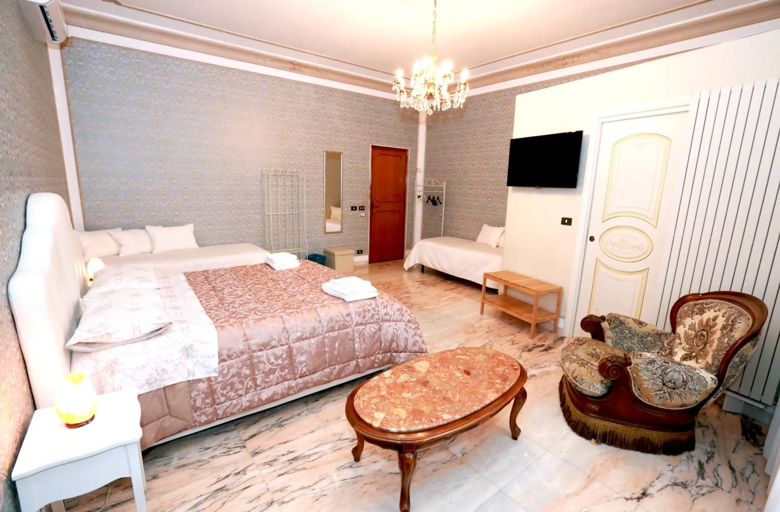Photo of the whole room, Bed in Apulia 70 Holidays - Suites & Experiences