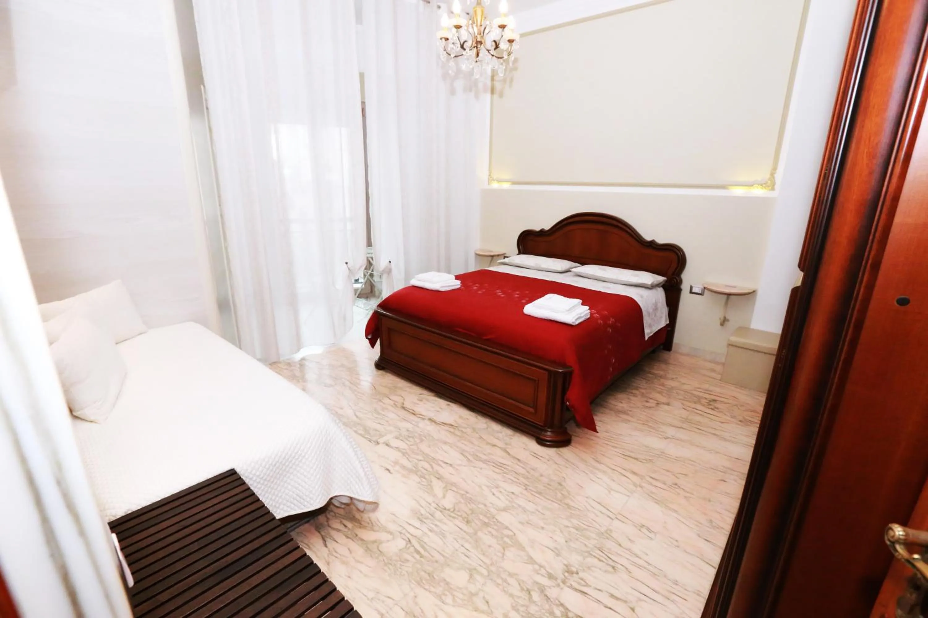 Photo of the whole room, Bed in Apulia 70 Holidays - Suites & Experiences