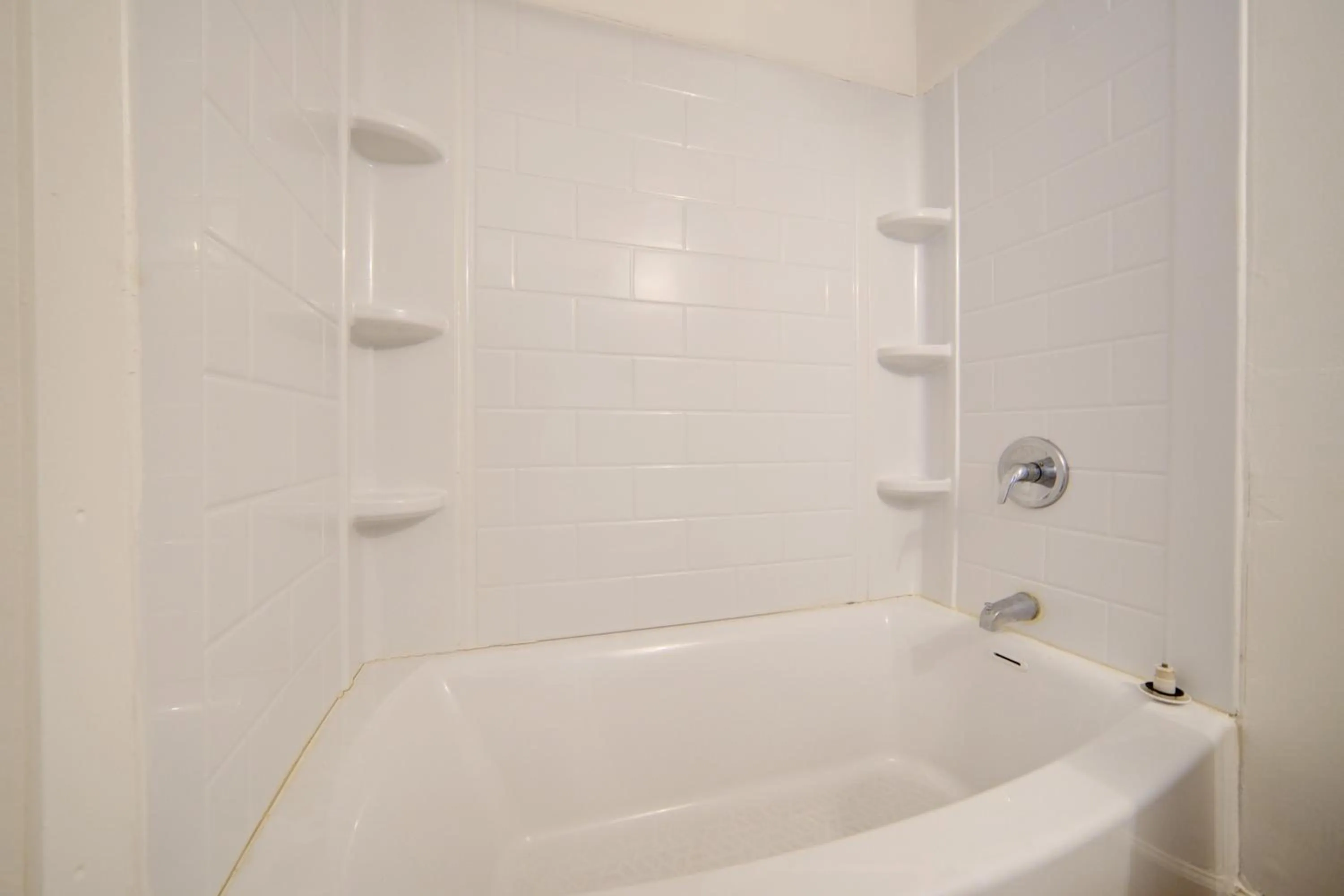 Bathroom in Cannon Inn By Capital O Gonzales Tx