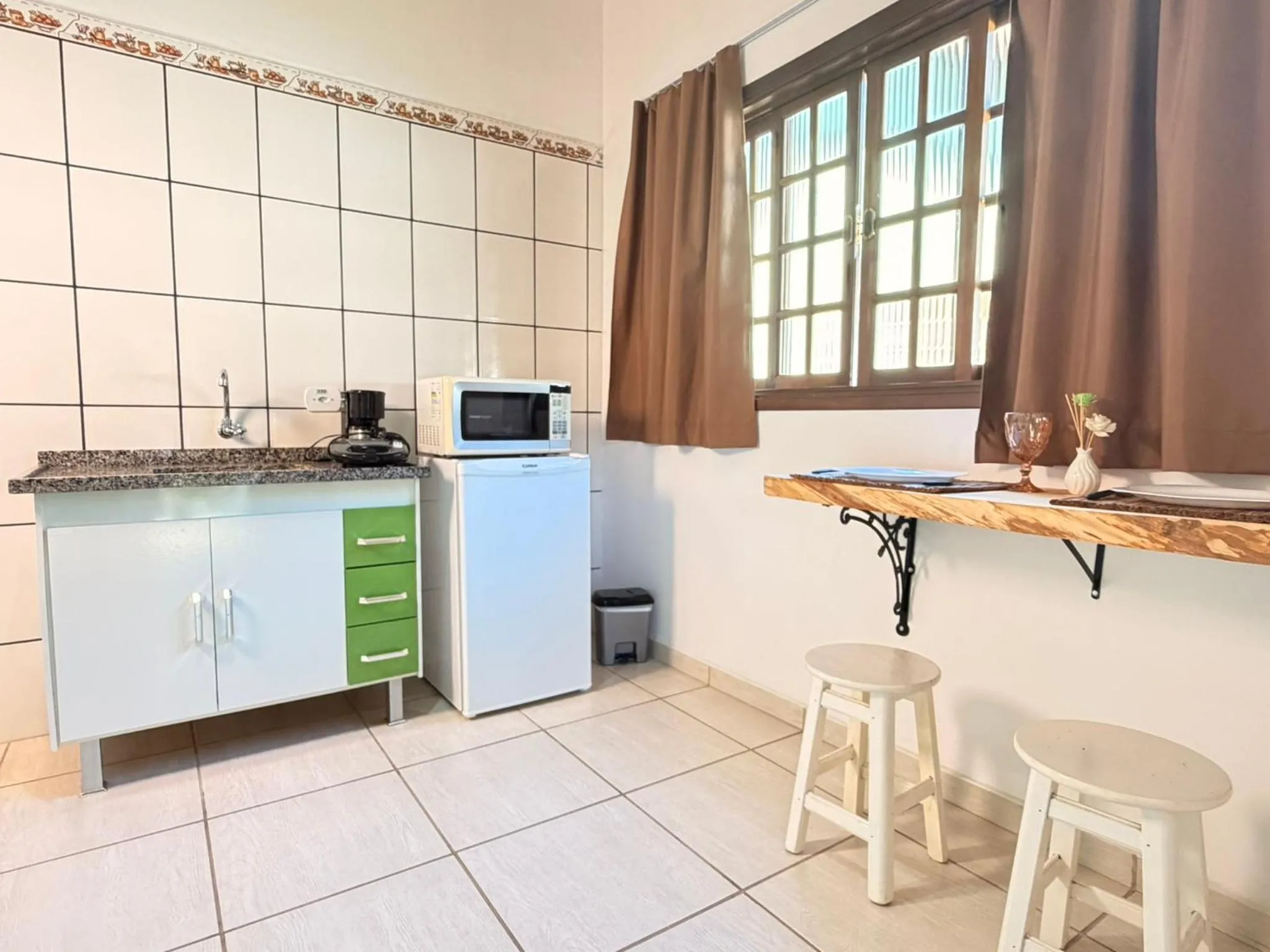 Kitchen or kitchenette in Juquinha Chalé