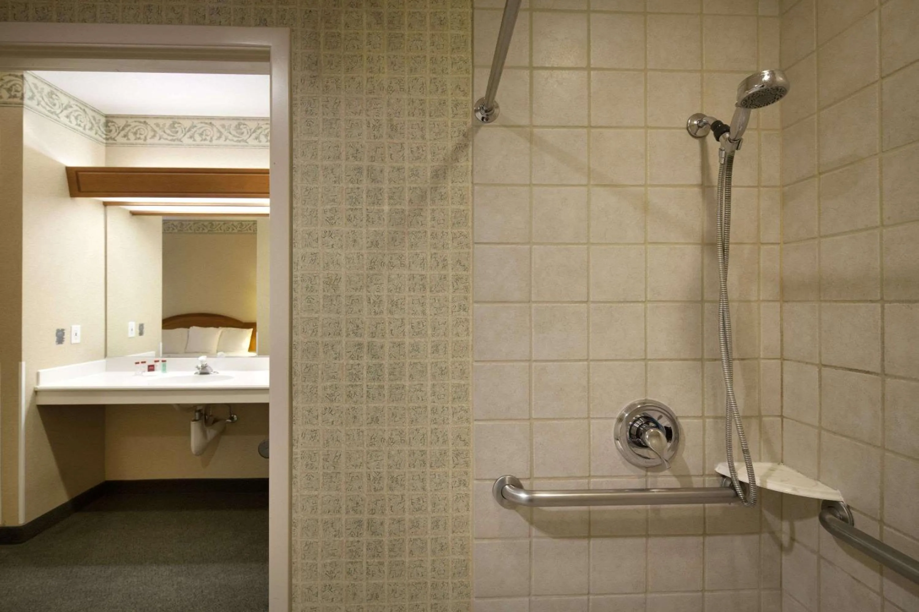 Bathroom in Ramada by Wyndham Olympia