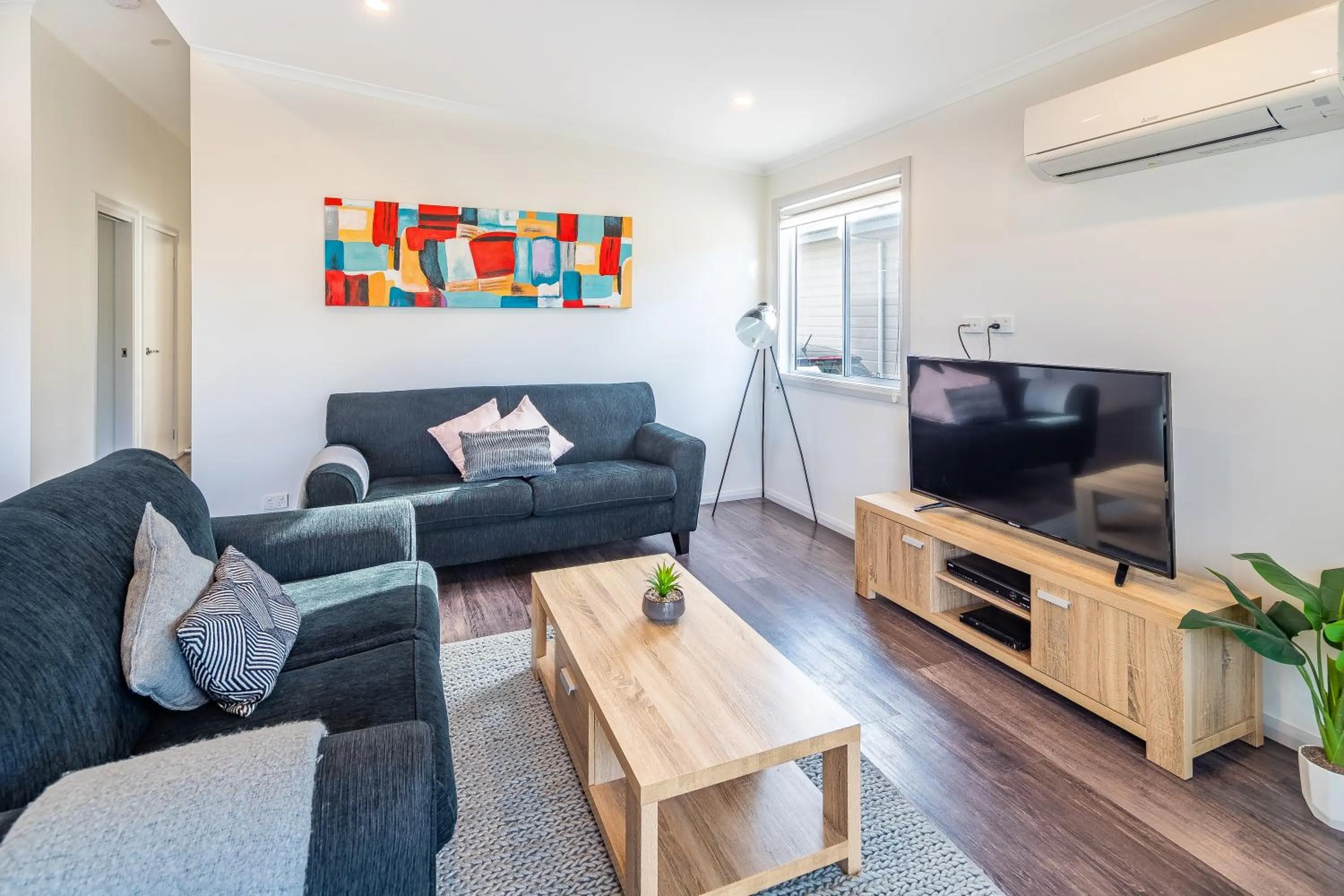 Communal lounge/ TV room in Ingenia Holidays One Mile Beach