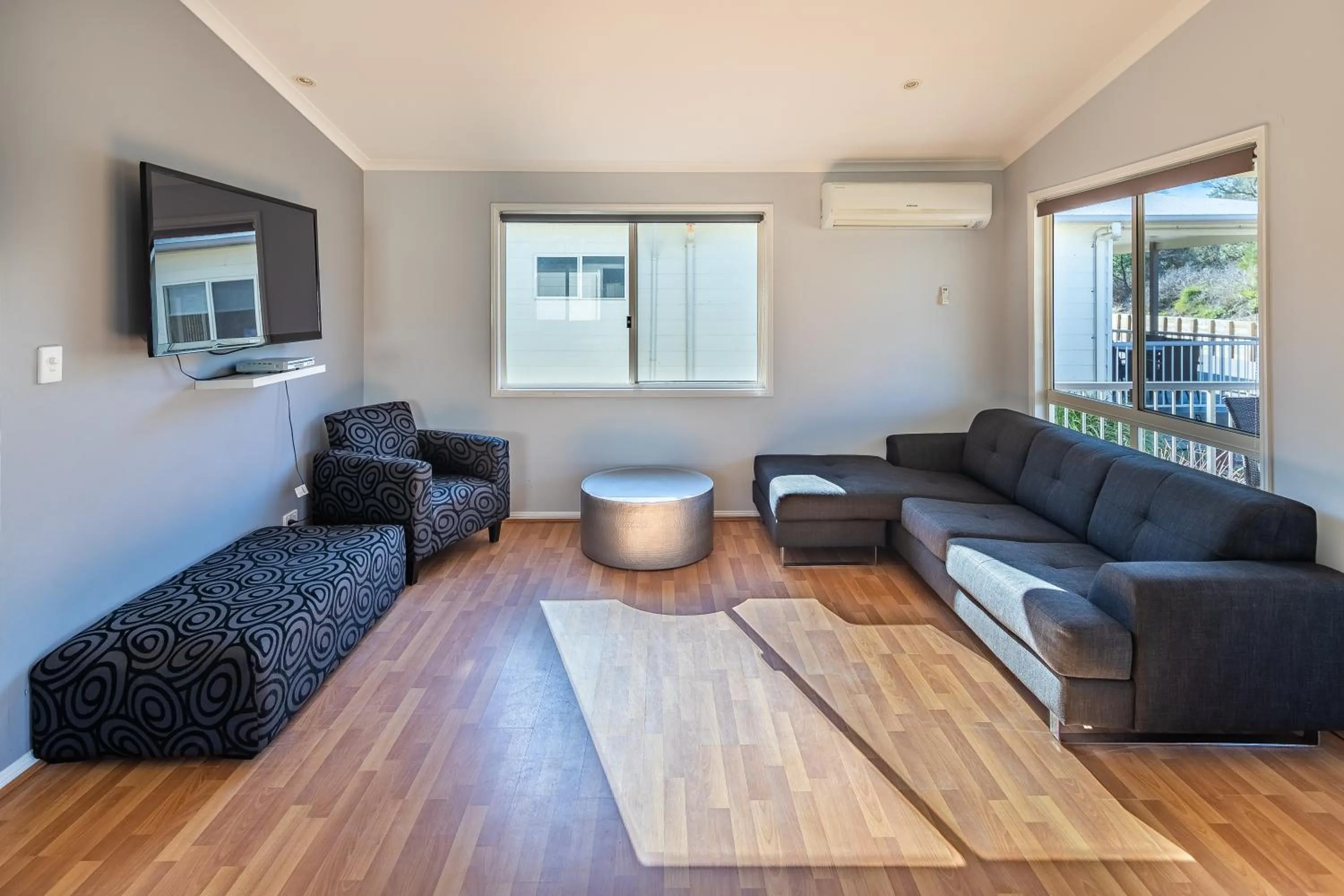 Living room in Ingenia Holidays One Mile Beach