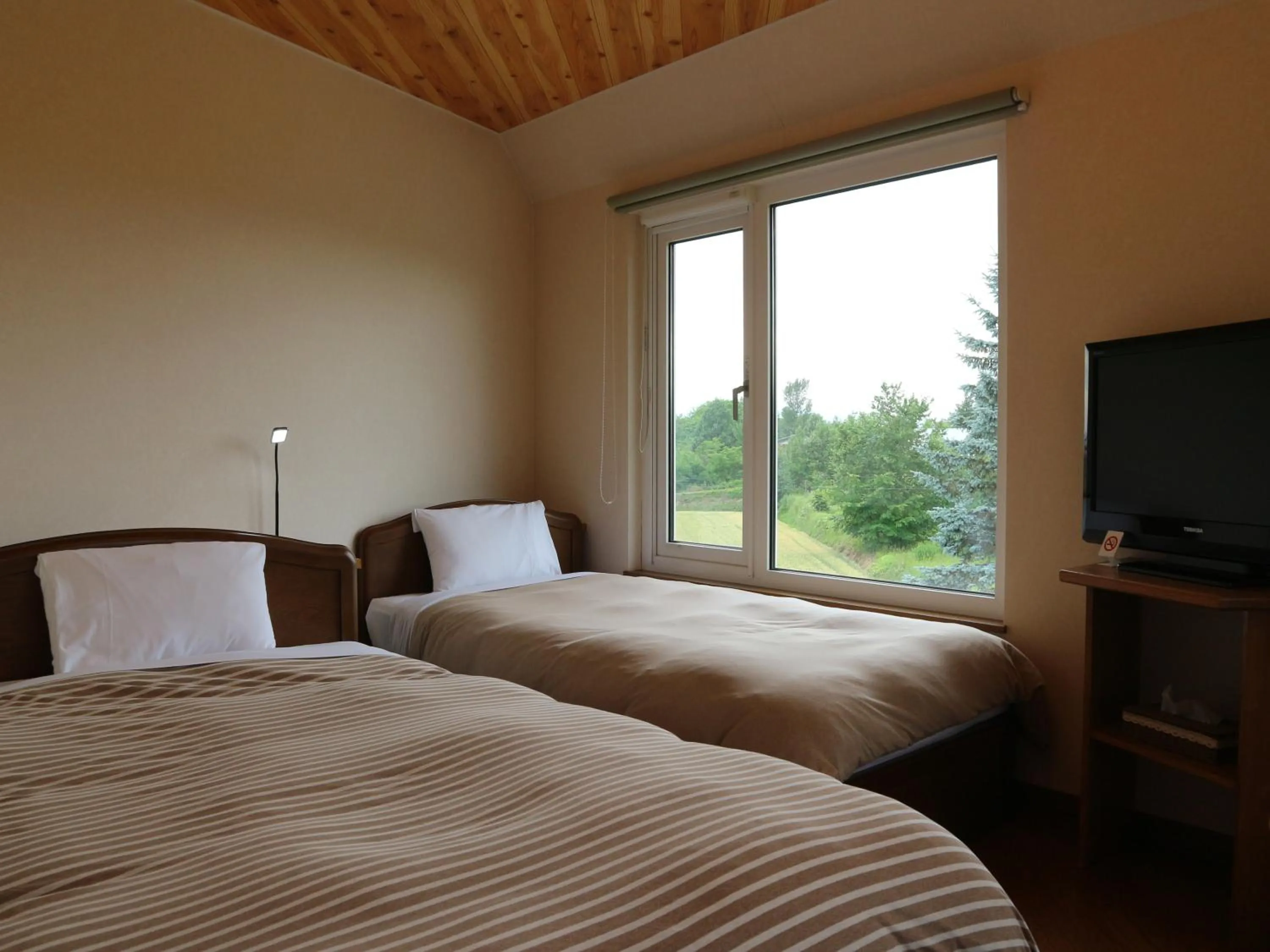 Photo of the whole room, Bed in Pension Landscape Furano
