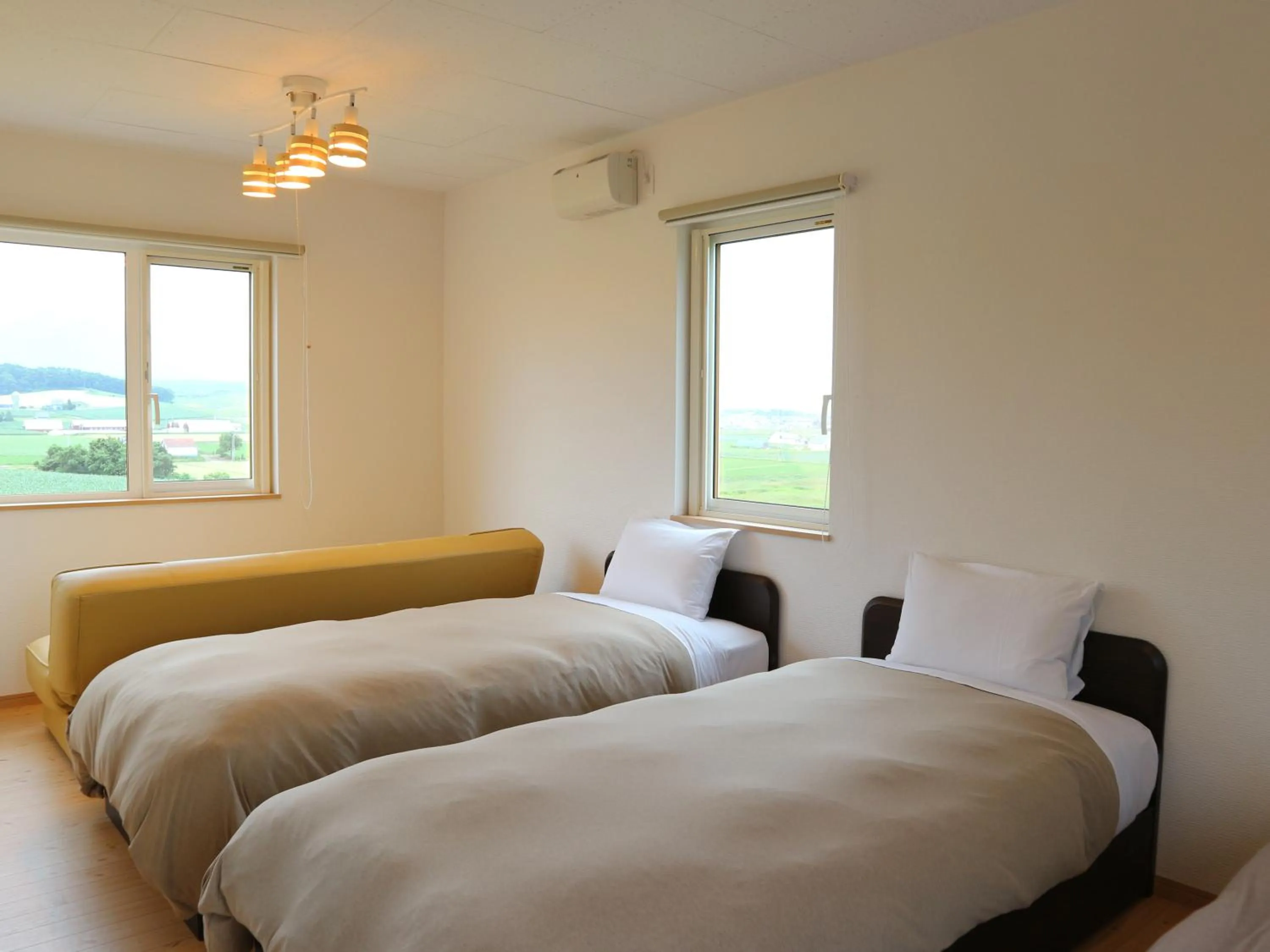 Photo of the whole room, Bed in Pension Landscape Furano