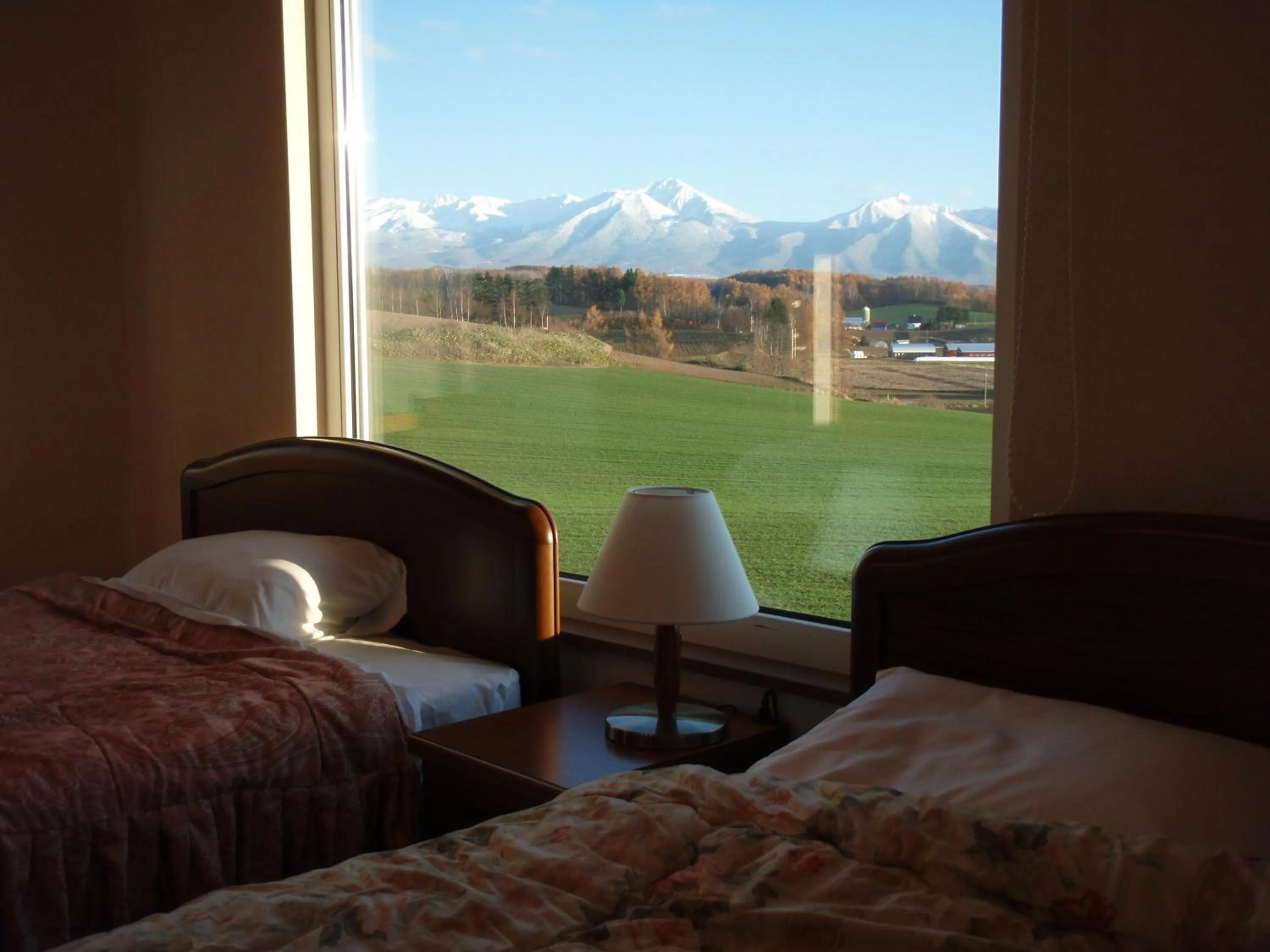 Bed in Pension Landscape Furano
