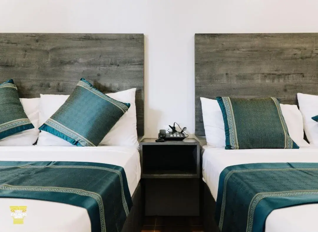 Bed in El Palacio Hotel & Resort Bed in El Palacio Hotel & Resort