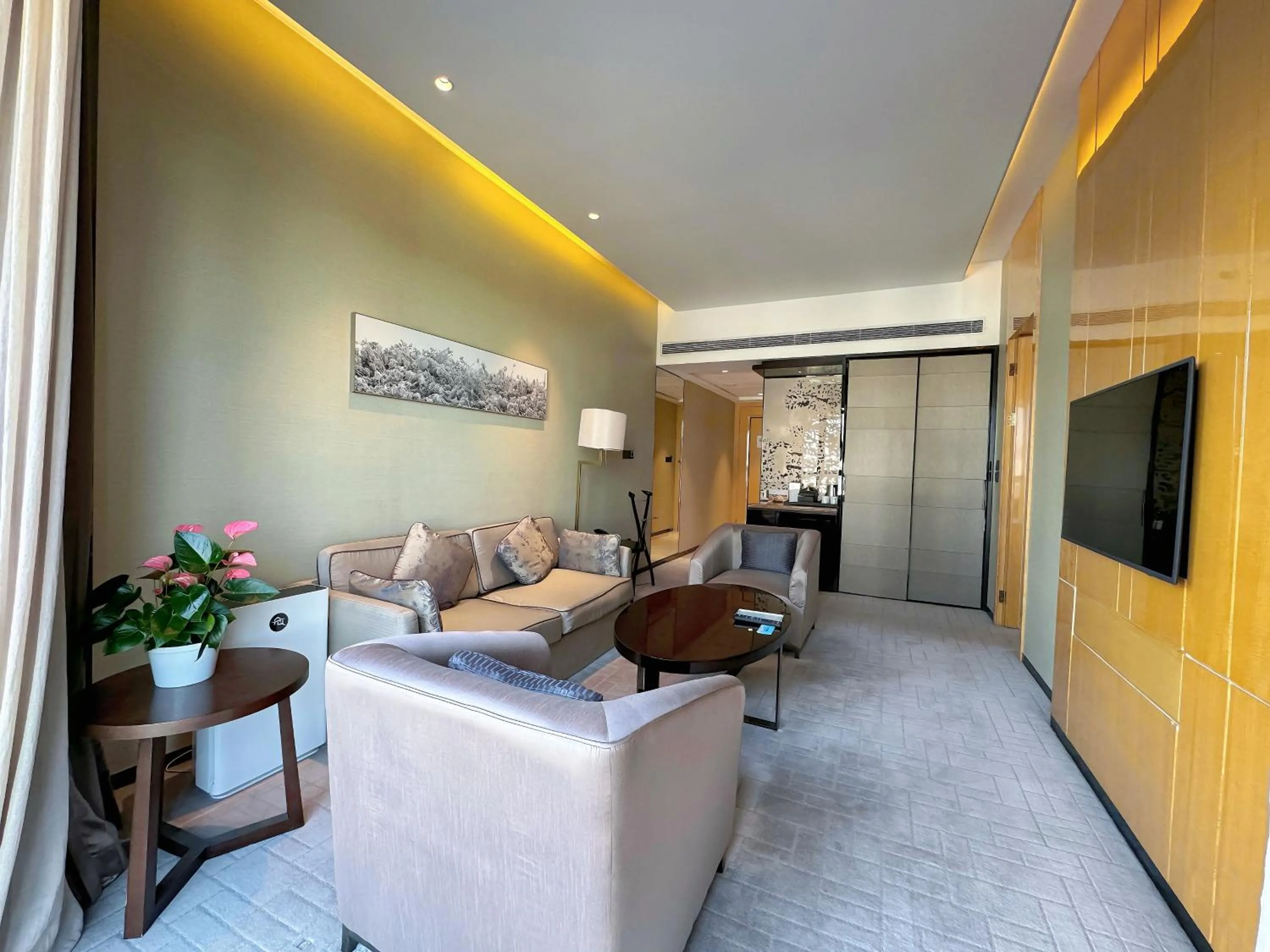 Living room in Crowne Plaza Beijing Lido by IHG