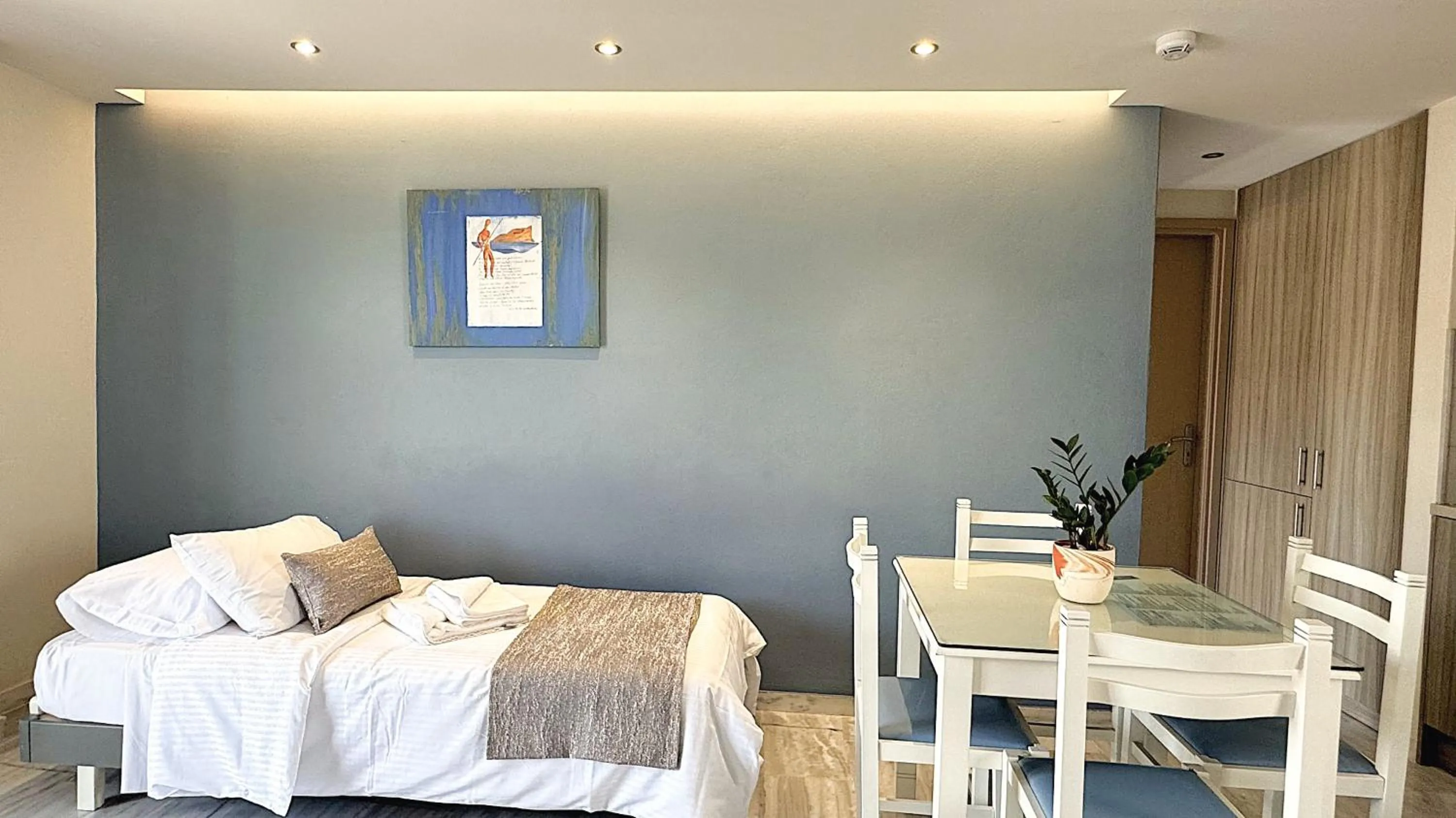 Bed in Vesperi Studios & Apartments