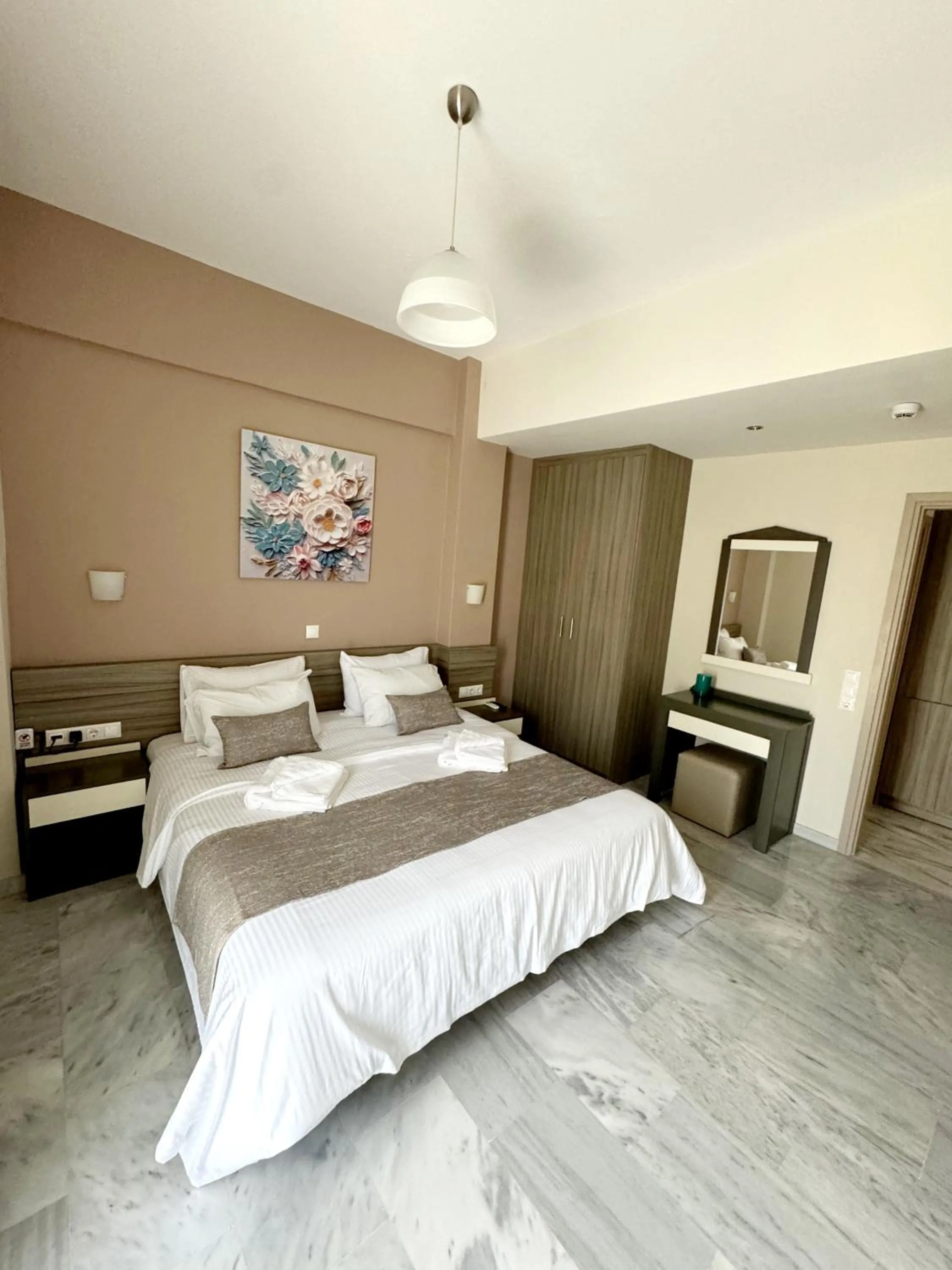 Bed in Vesperi Studios & Apartments