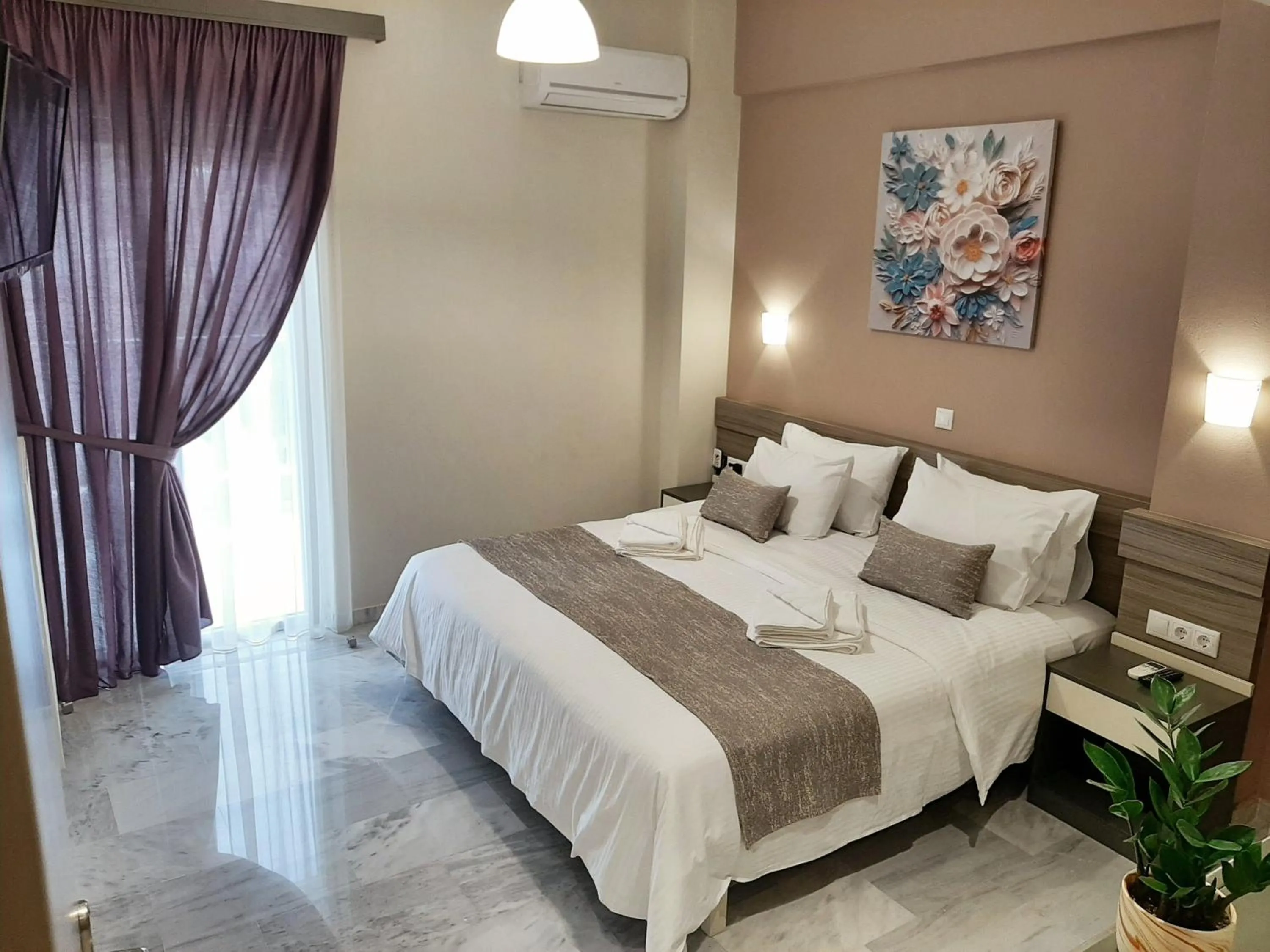 Bed in Vesperi Studios & Apartments