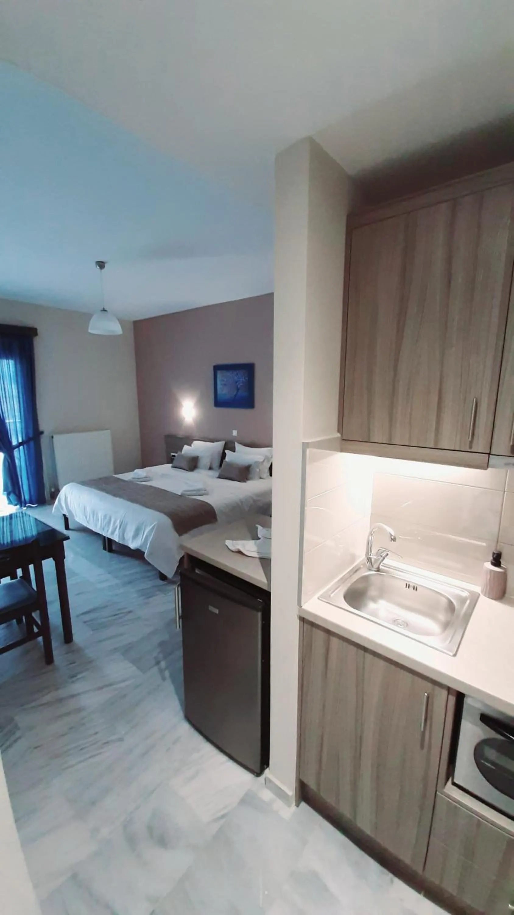 Kitchen or kitchenette, Bed in Vesperi Studios & Apartments