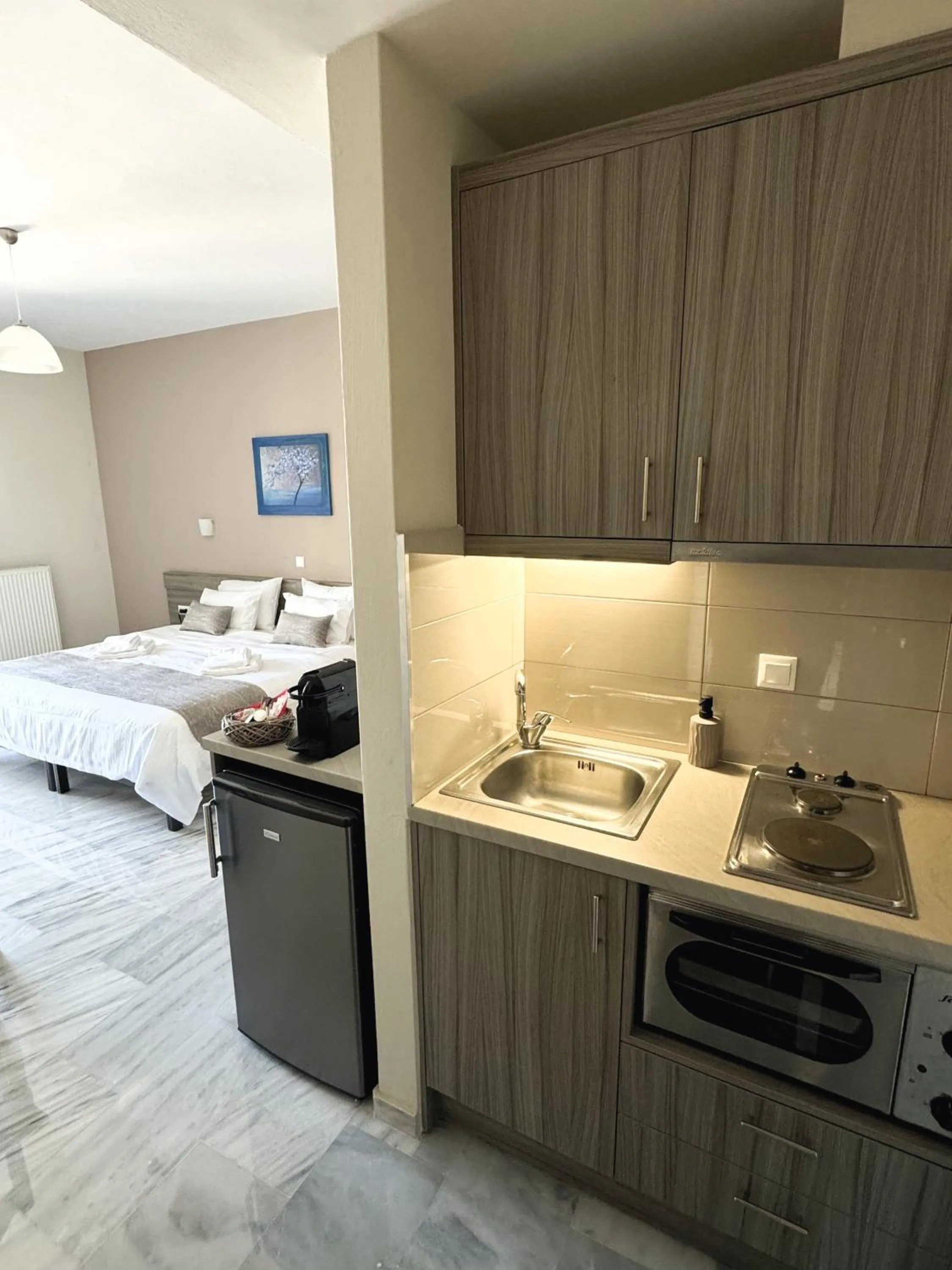 Kitchen or kitchenette, Bed in Vesperi Studios & Apartments