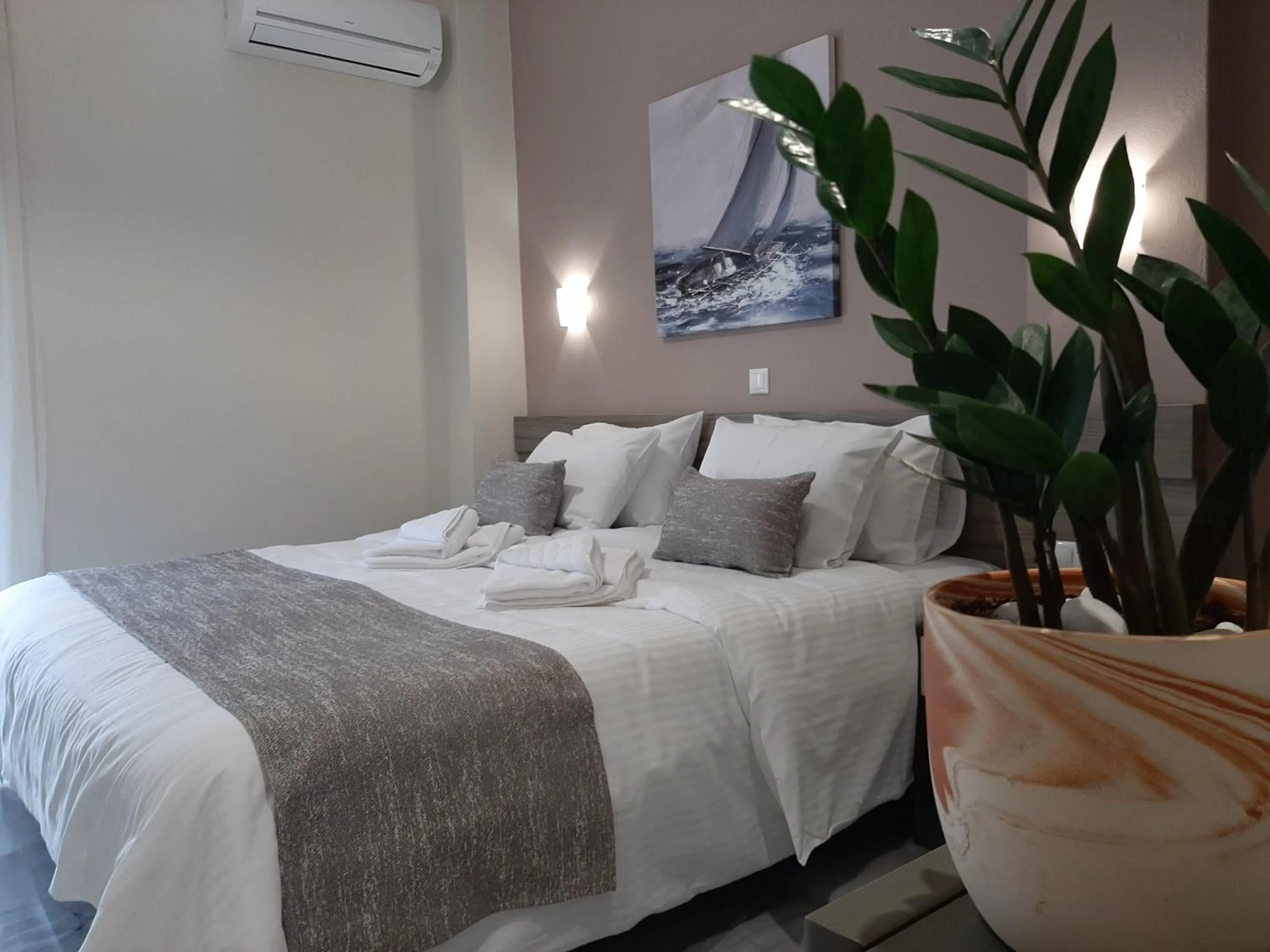 Bed in Vesperi Studios & Apartments