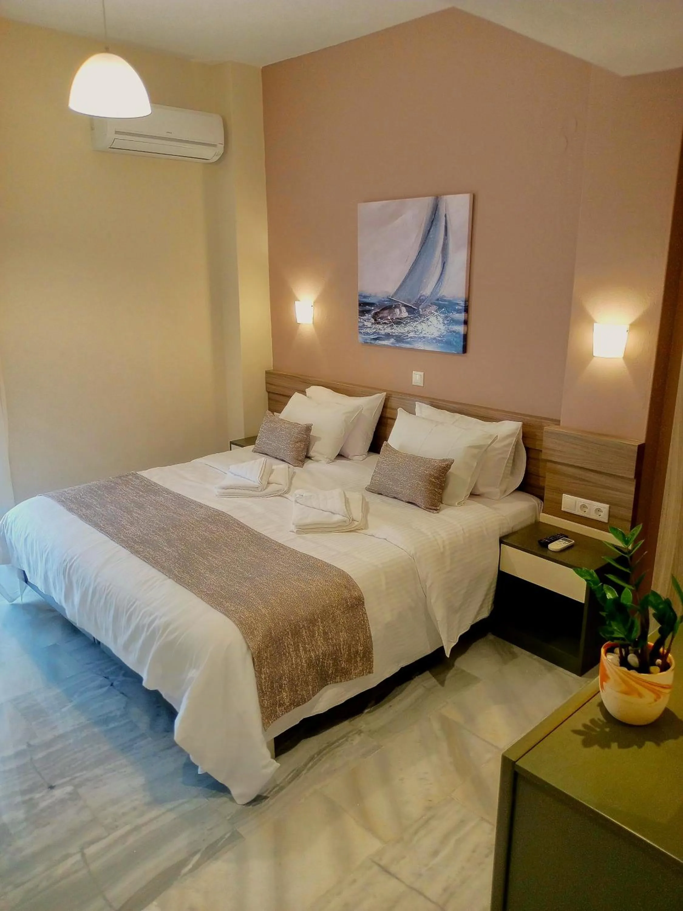 Bed in Vesperi Studios & Apartments