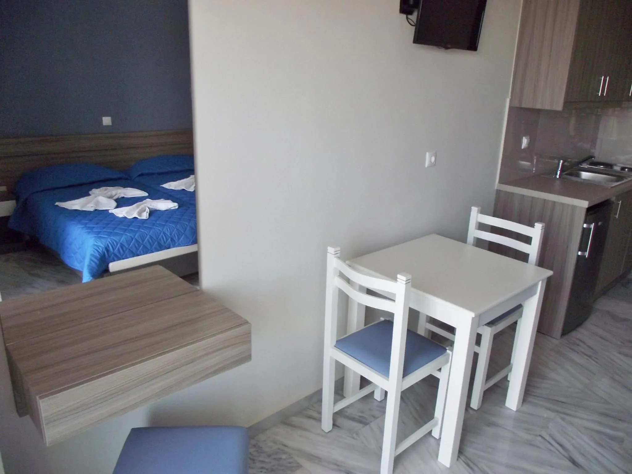 Bed in Vesperi Studios & Apartments