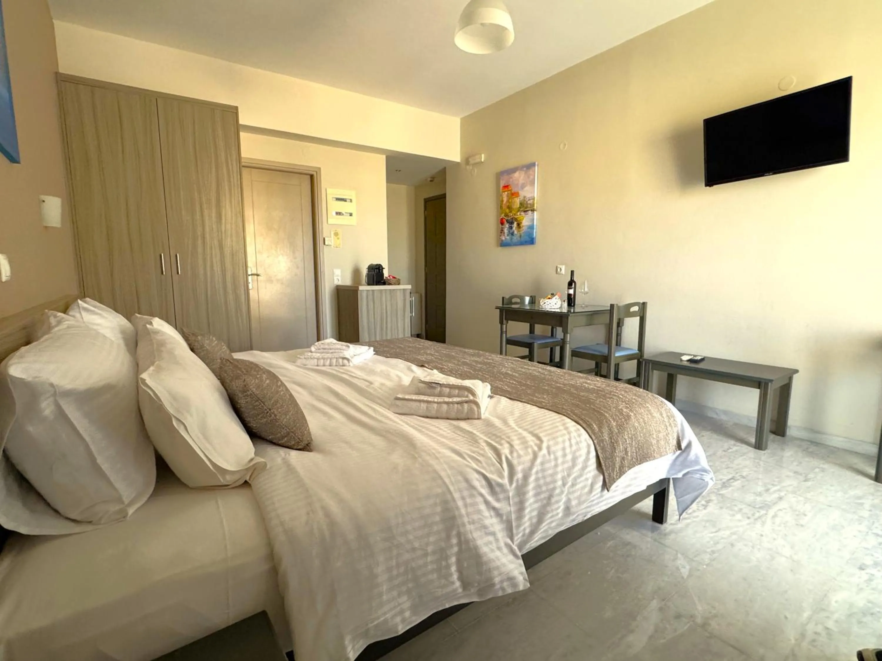 Bed in Vesperi Studios & Apartments