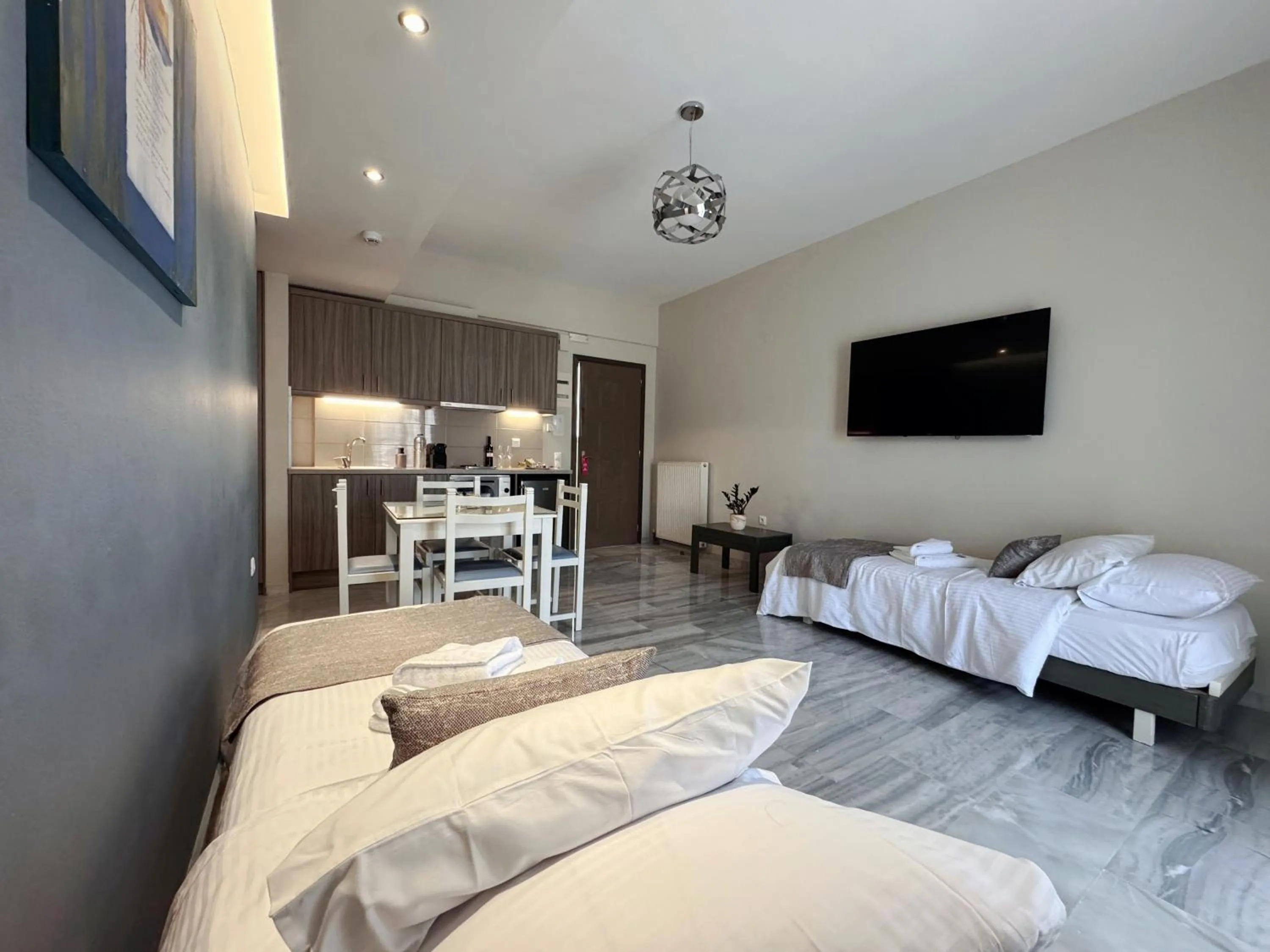 Bed in Vesperi Studios & Apartments
