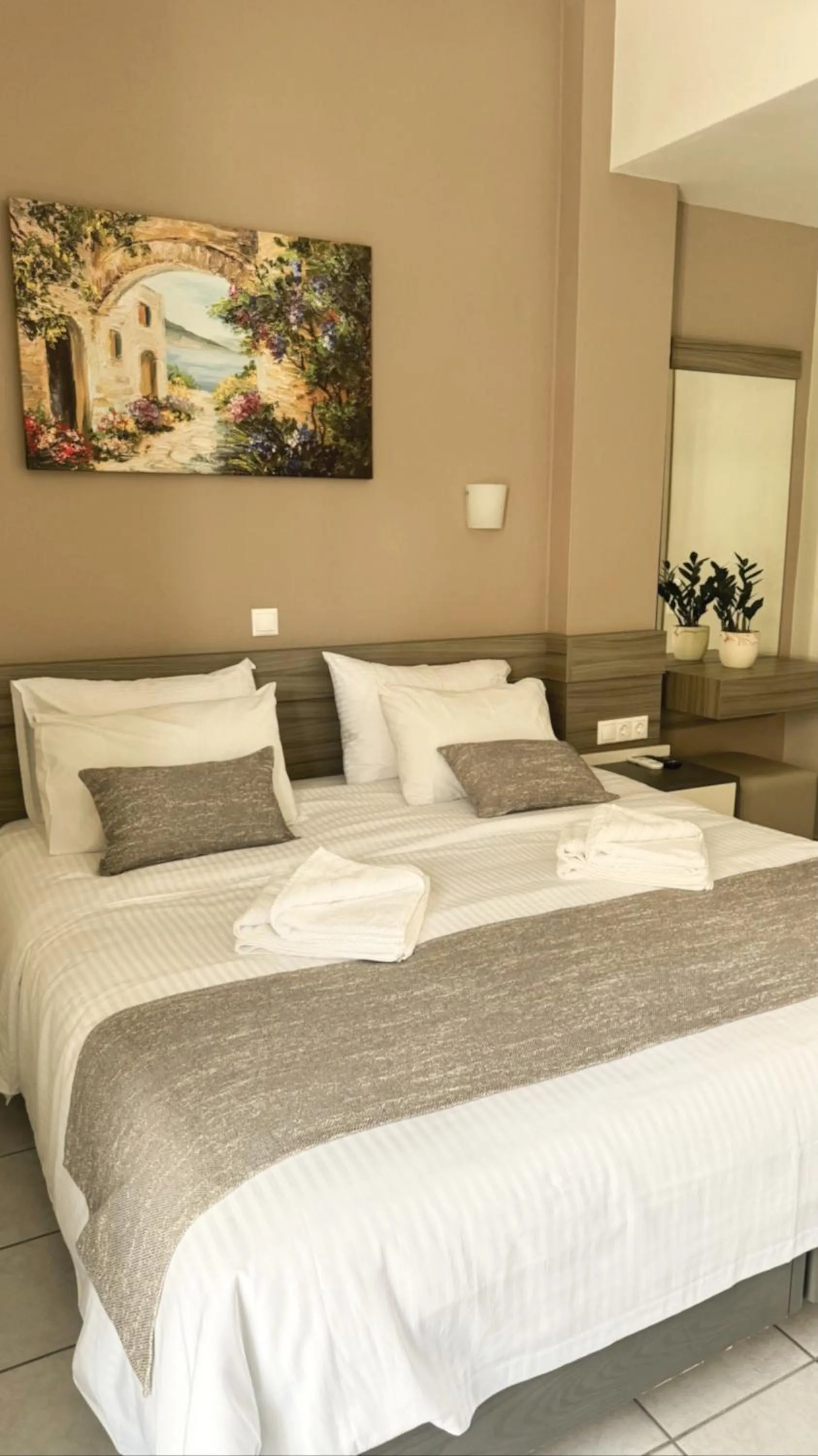 Bed in Vesperi Studios & Apartments