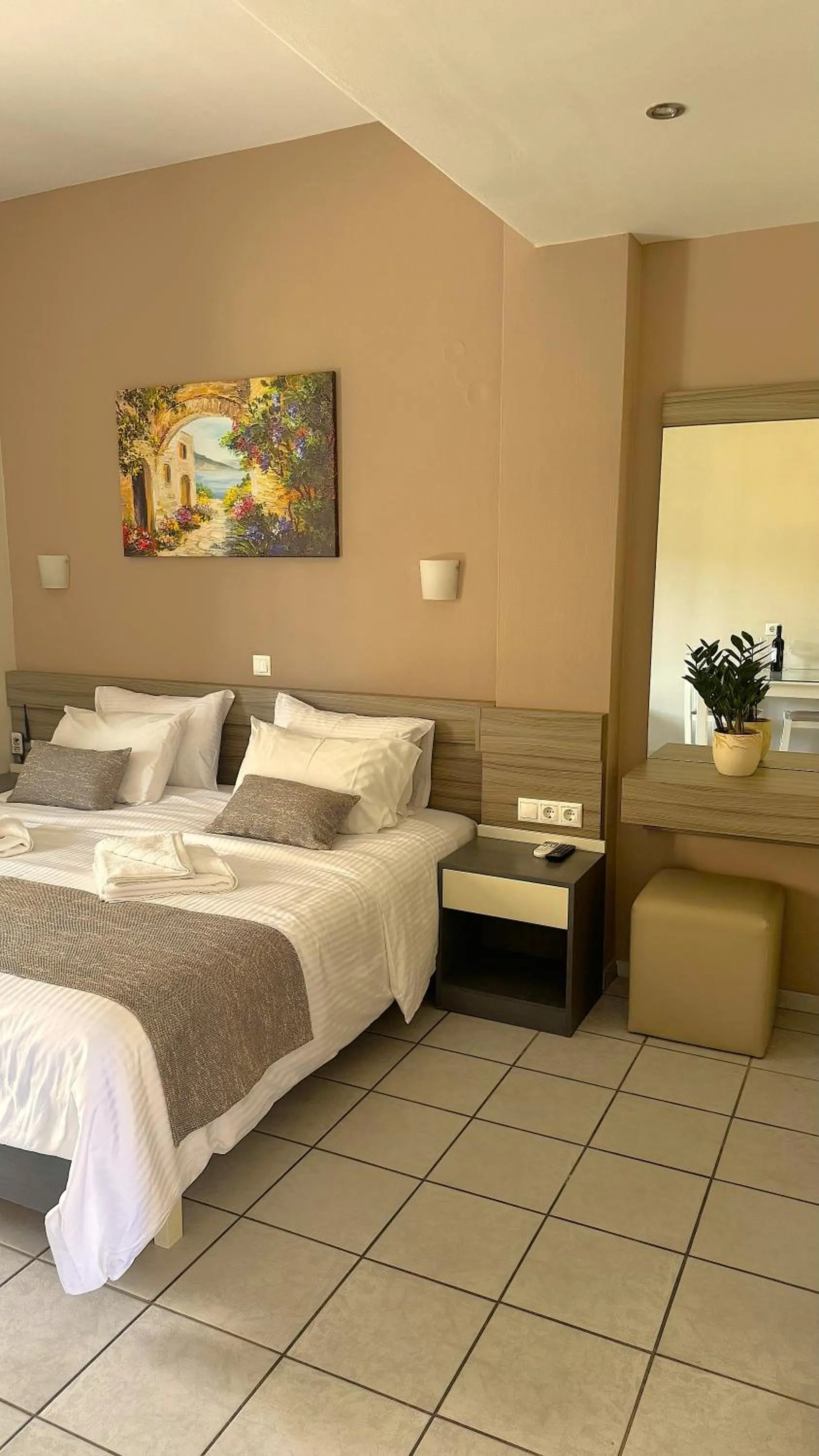 Bed in Vesperi Studios & Apartments