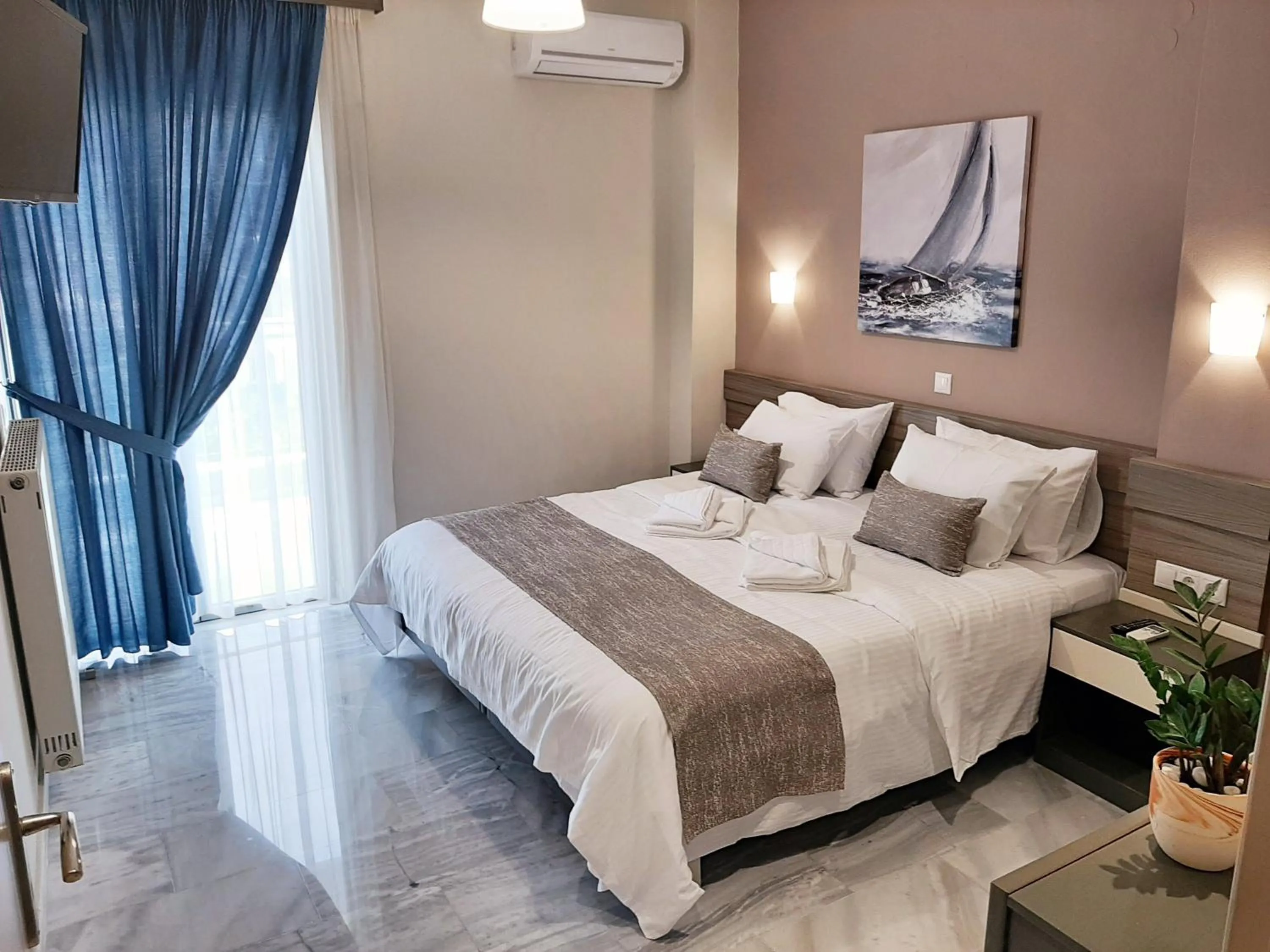 Bed in Vesperi Studios & Apartments