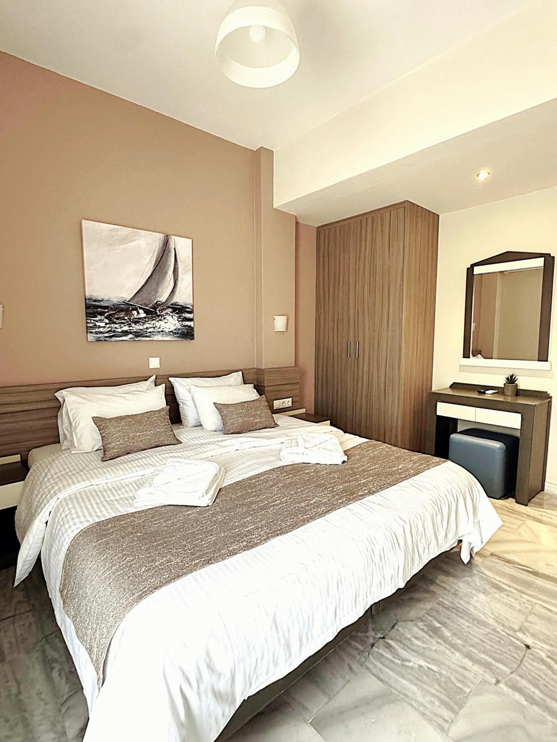Bed in Vesperi Studios & Apartments