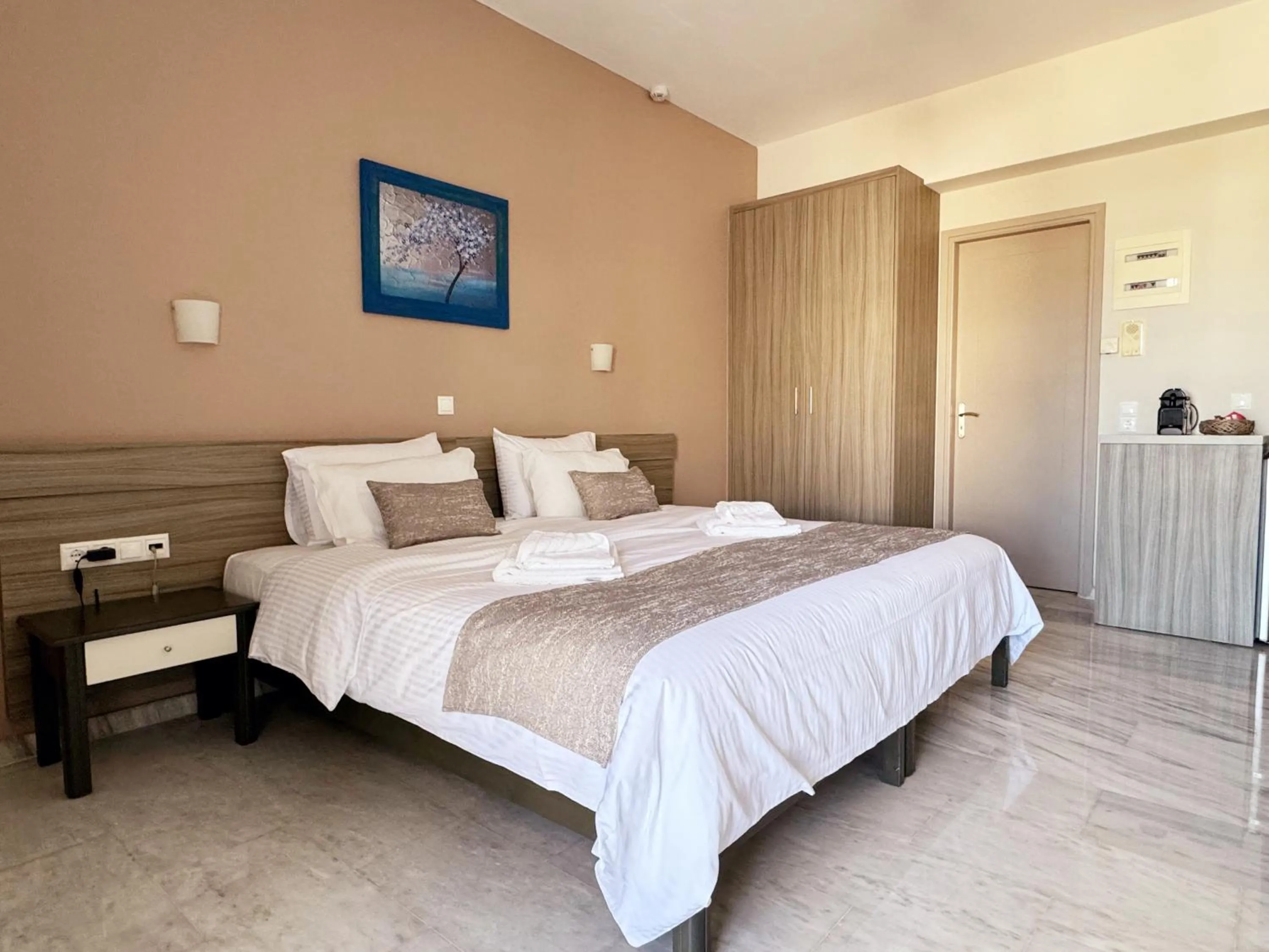 Bed in Vesperi Studios & Apartments