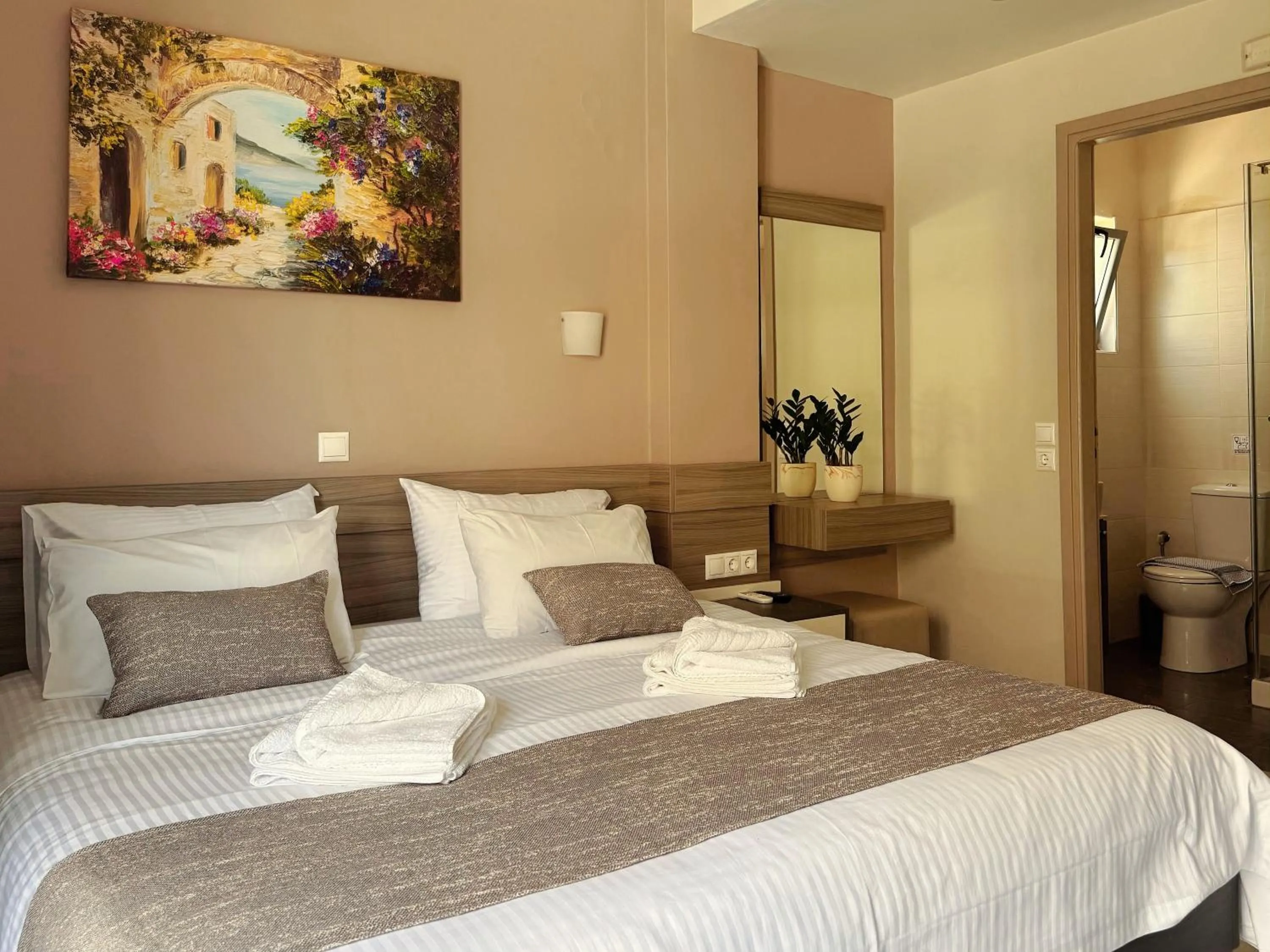 Bed in Vesperi Studios & Apartments