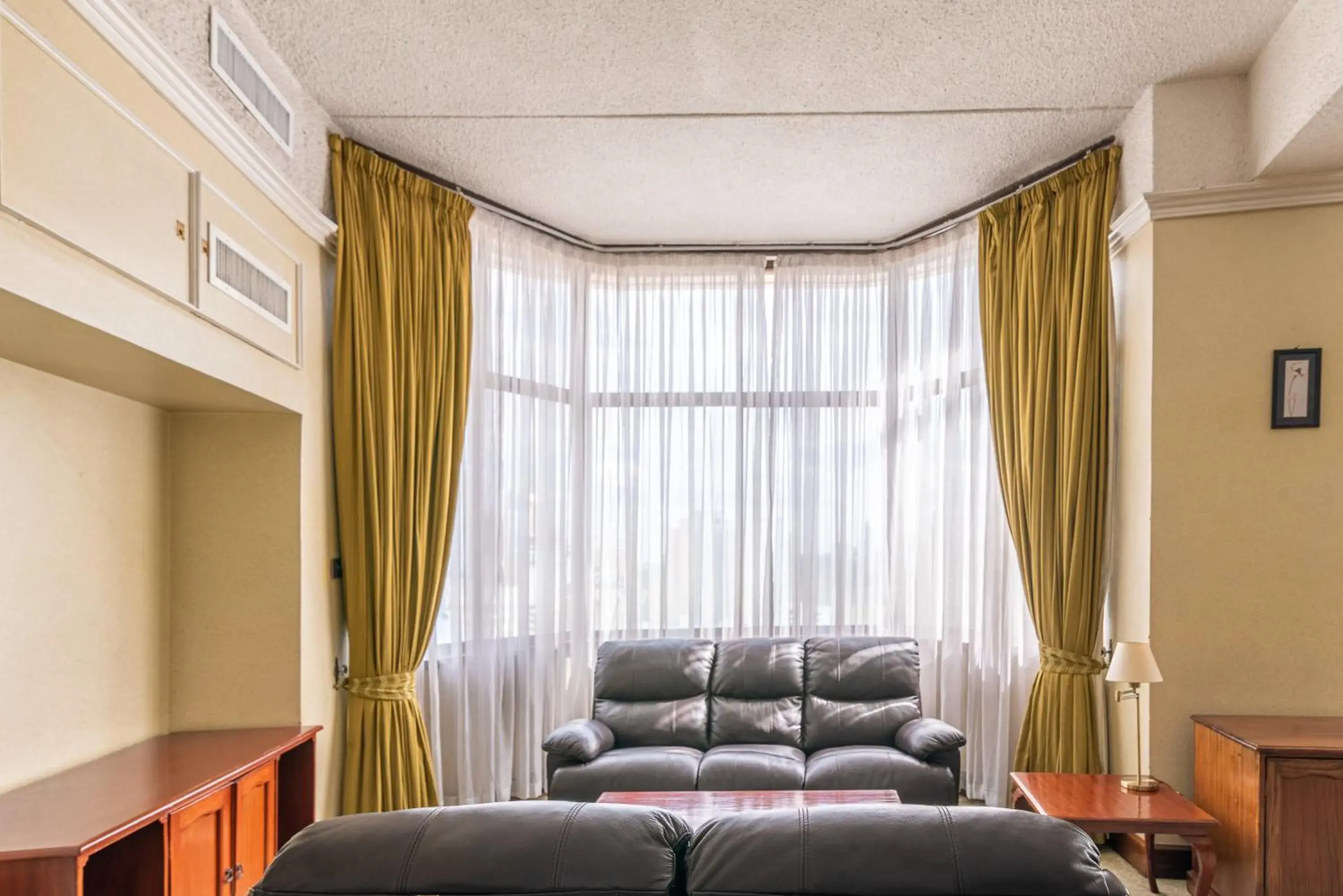 Seating area, Bed in Nairobi Safari Club by Swiss-Belhotel Seating area, Bed in Nairobi Safari Club by Swiss-Belhotel