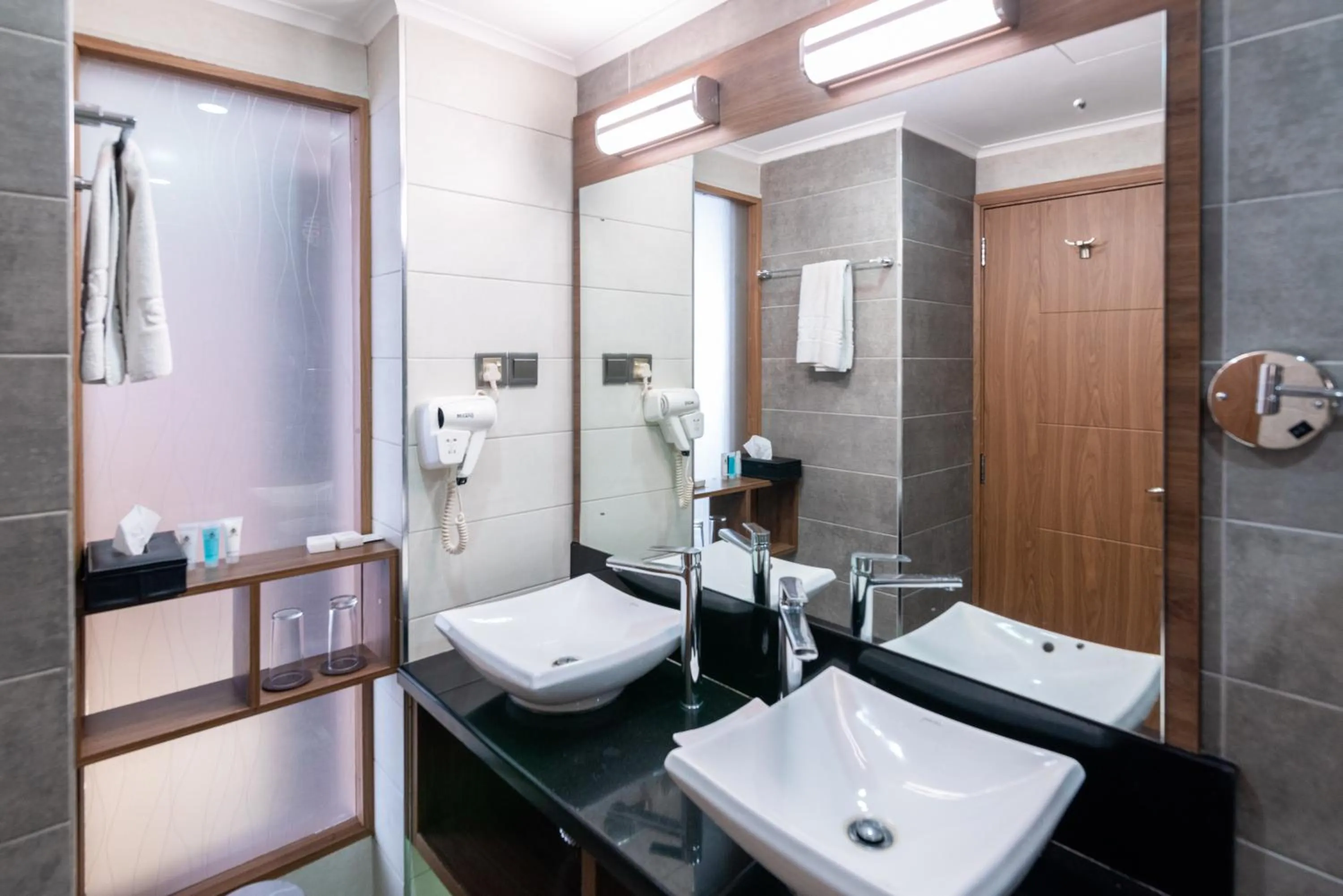 Bathroom in Nairobi Safari Club by Swiss-Belhotel