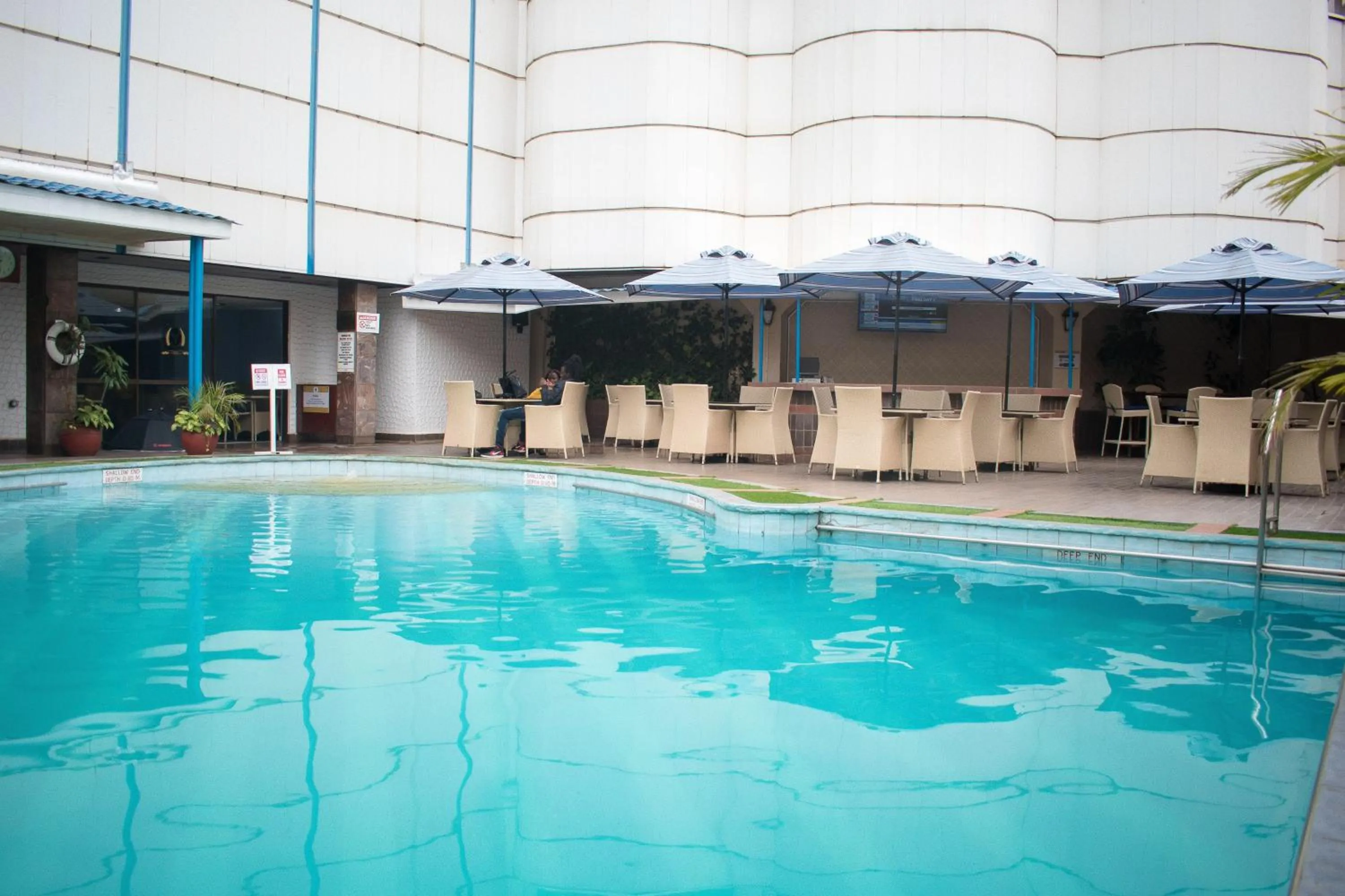 Pool view in Nairobi Safari Club by Swiss-Belhotel