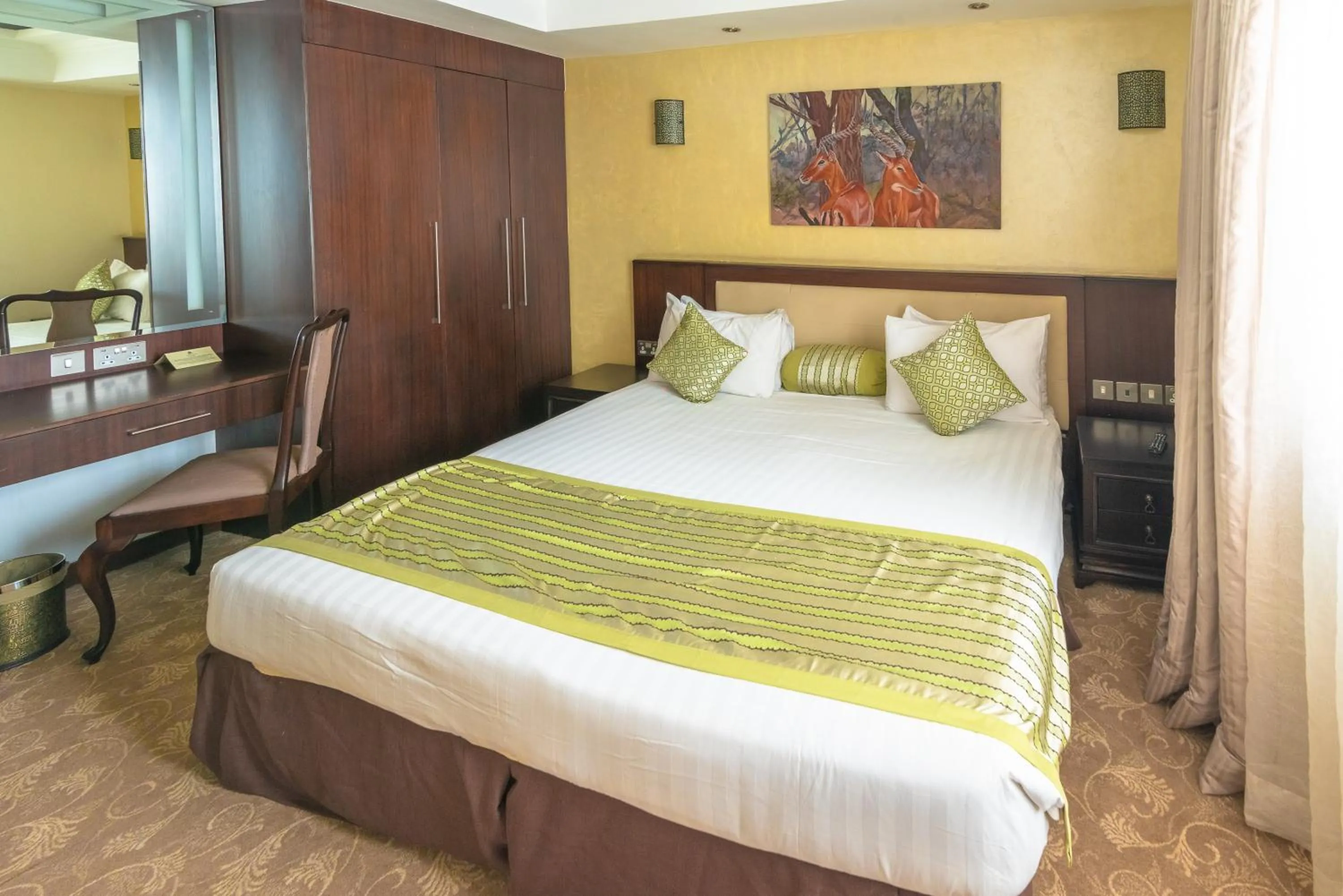 Bedroom, Bed in Nairobi Safari Club by Swiss-Belhotel