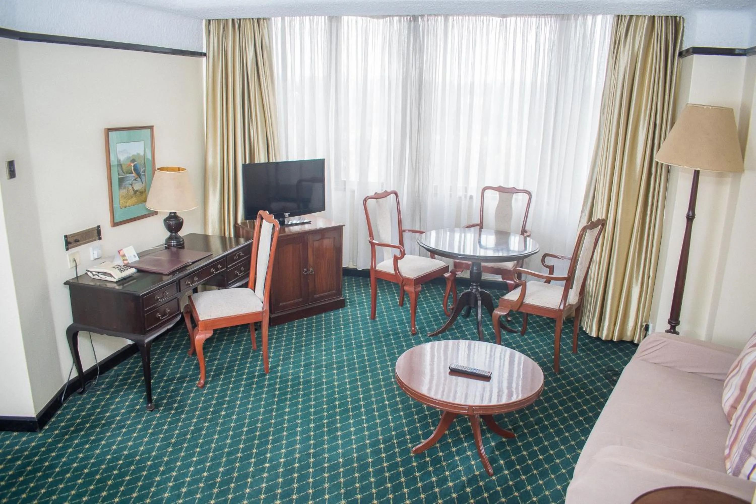 Living room in Nairobi Safari Club by Swiss-Belhotel