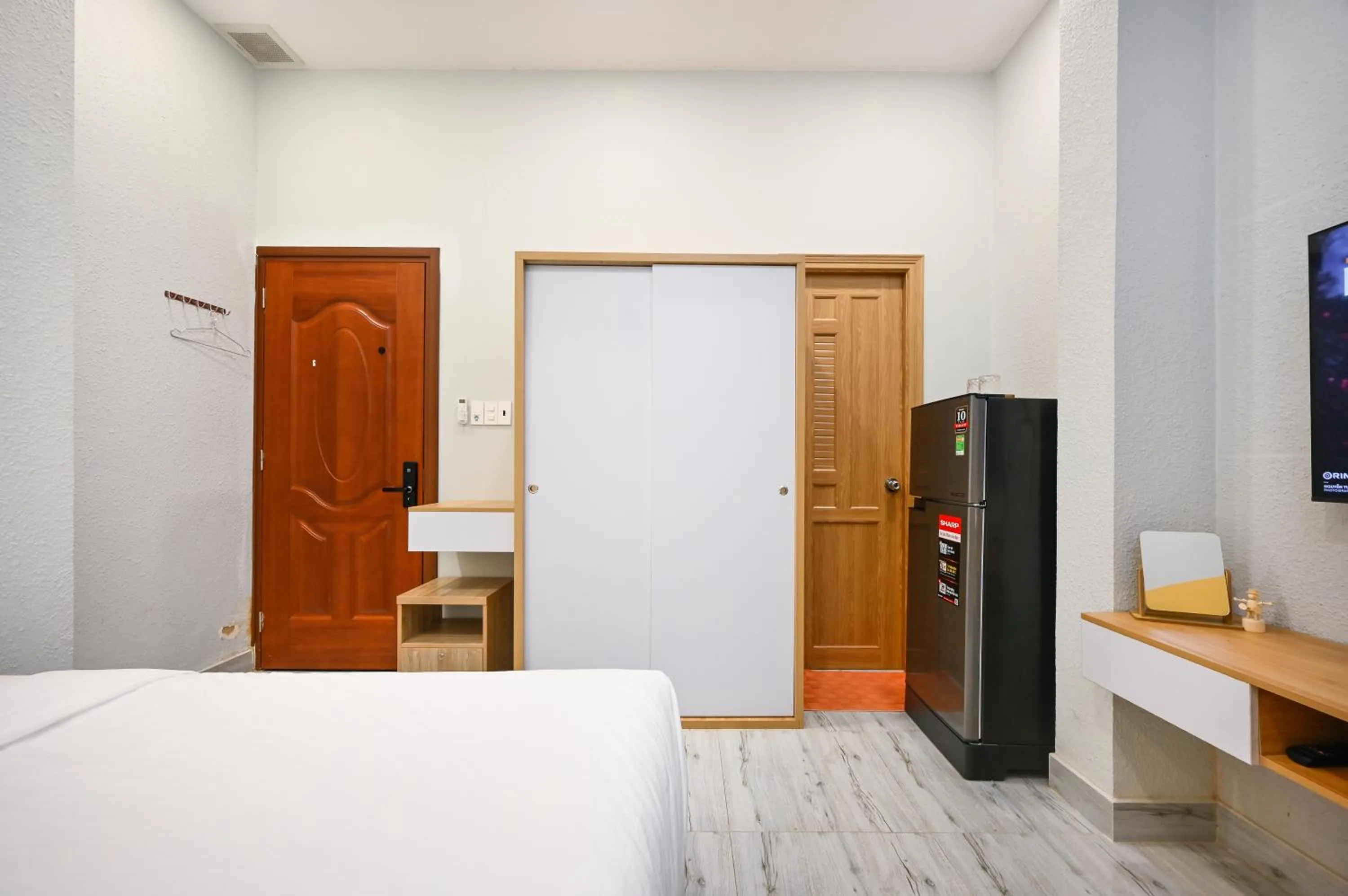 Living room, Bed in LalaHouse Spring Apartment - Saigon Center