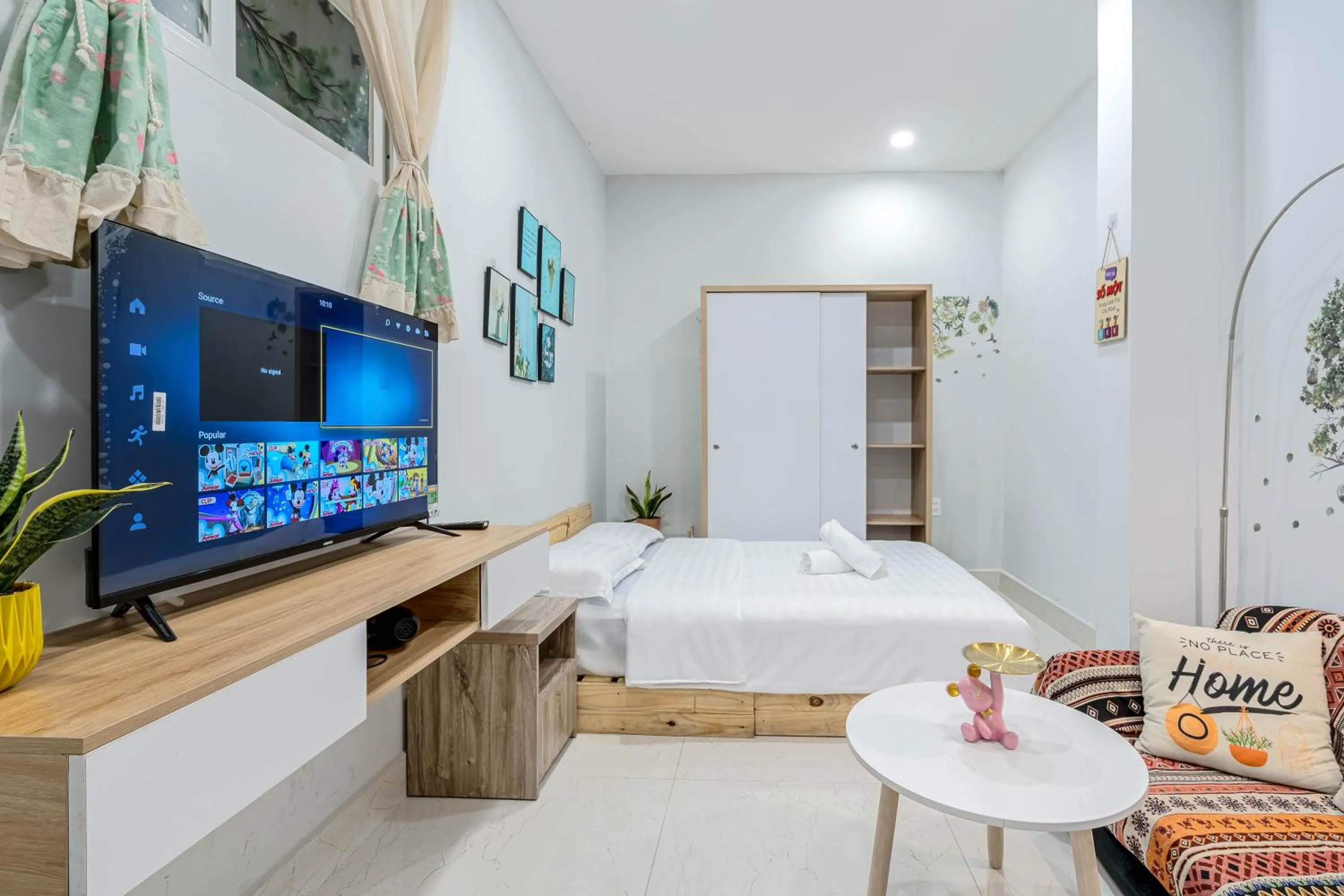 Communal lounge/ TV room, Bed in LalaHouse Spring Apartment - Saigon Center
