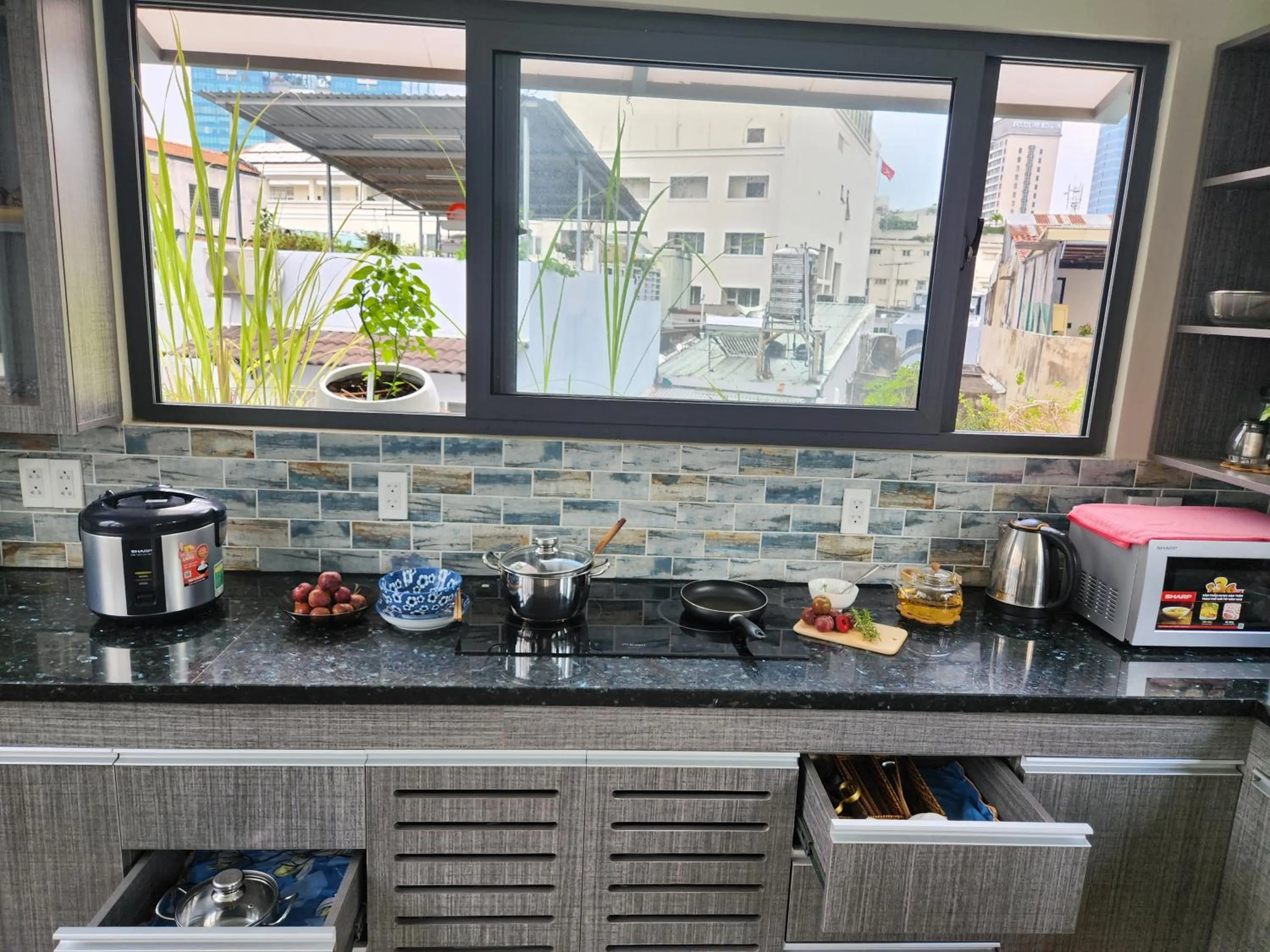 Kitchen or kitchenette in LalaHouse Spring Apartment - Saigon Center