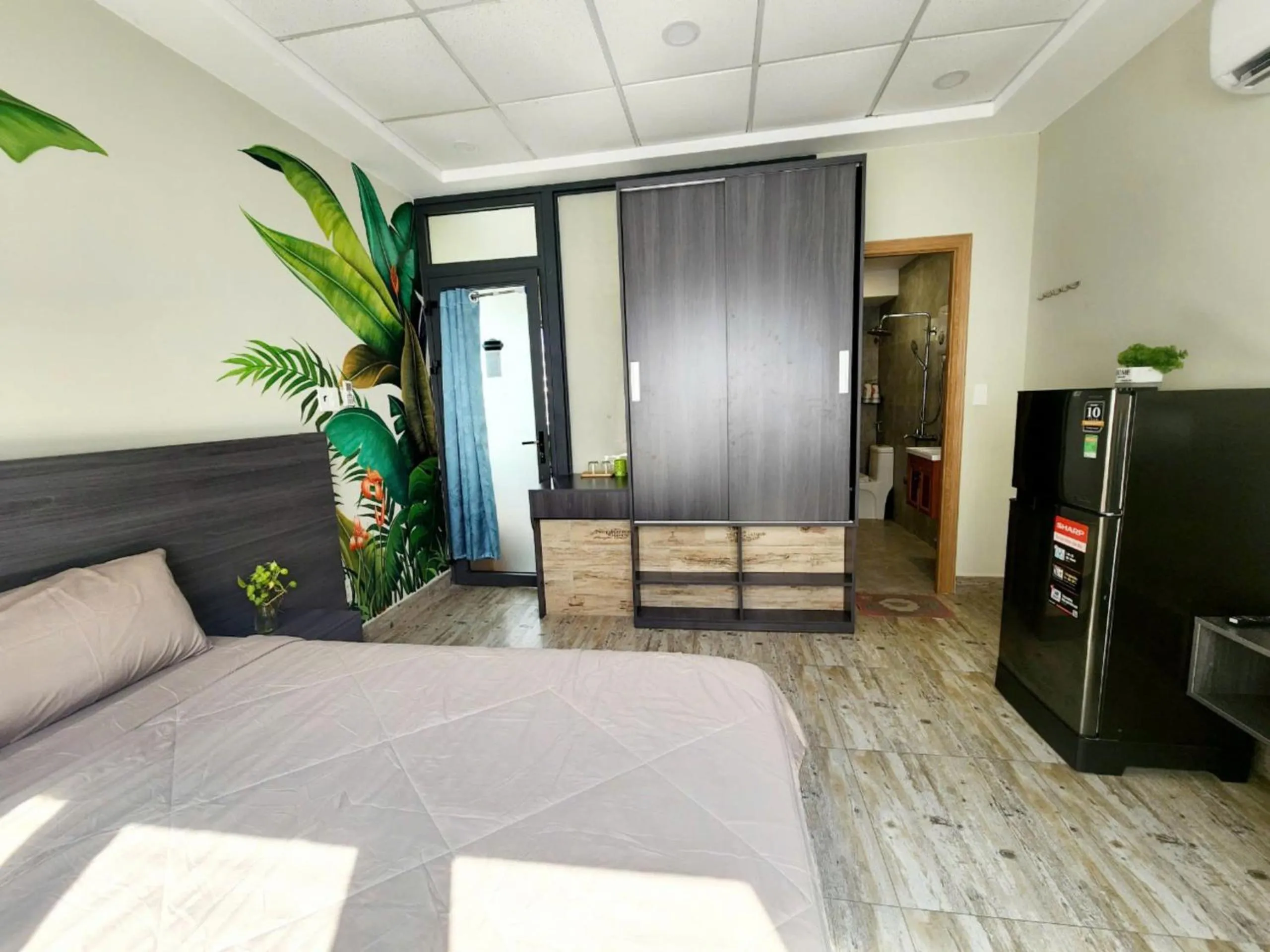 Photo of the whole room, Bed in LalaHouse Spring Apartment - Saigon Center