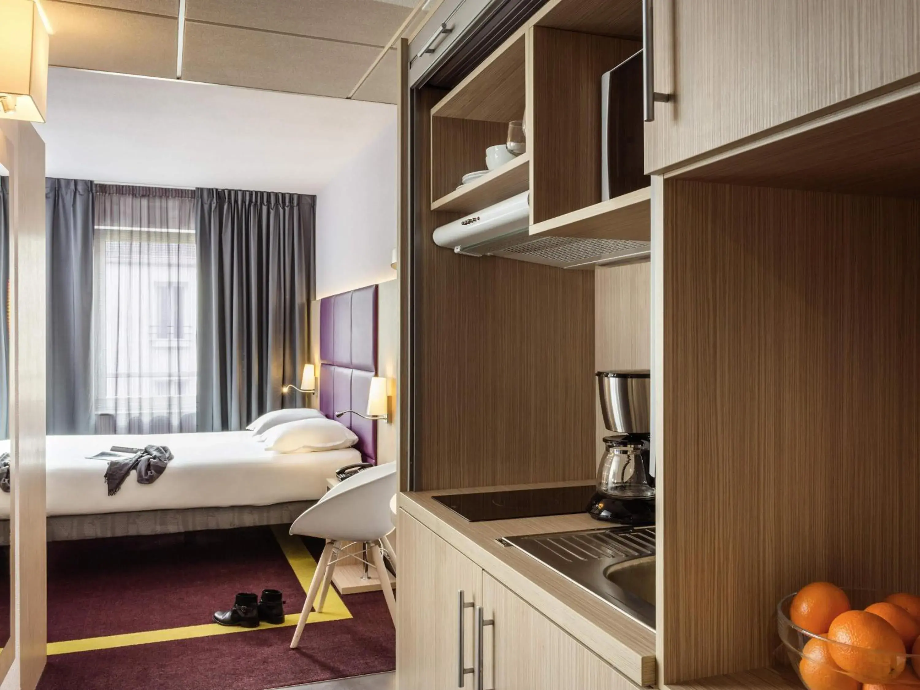 Bedroom, Bed in Aparthotel Adagio Paris Malakoff Chatillon Bedroom, Bed in Aparthotel Adagio Paris Malakoff Chatillon