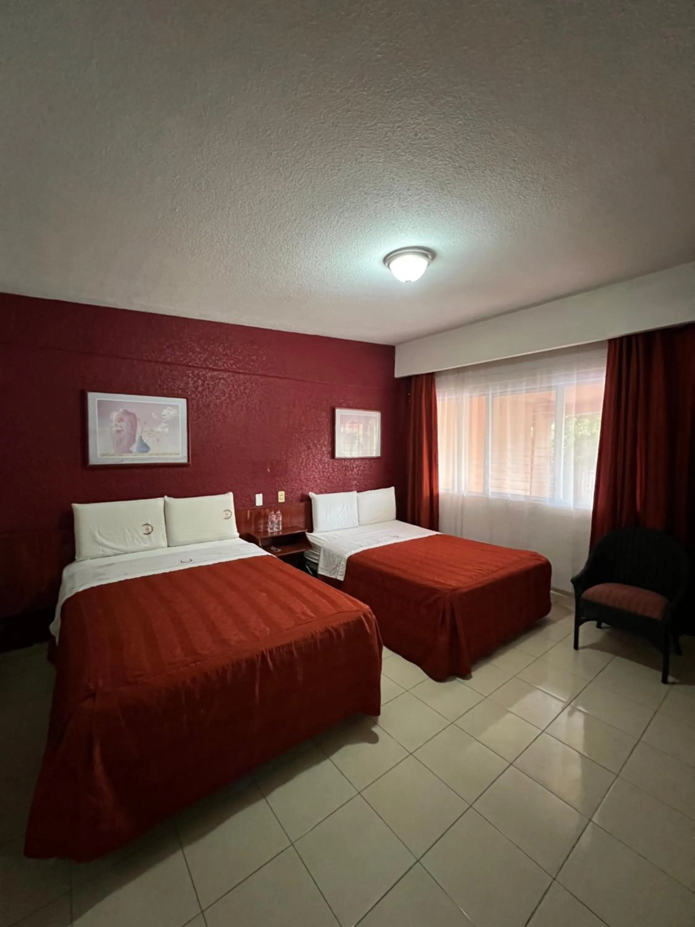 Bed in Hotel La Quinta Posada Real