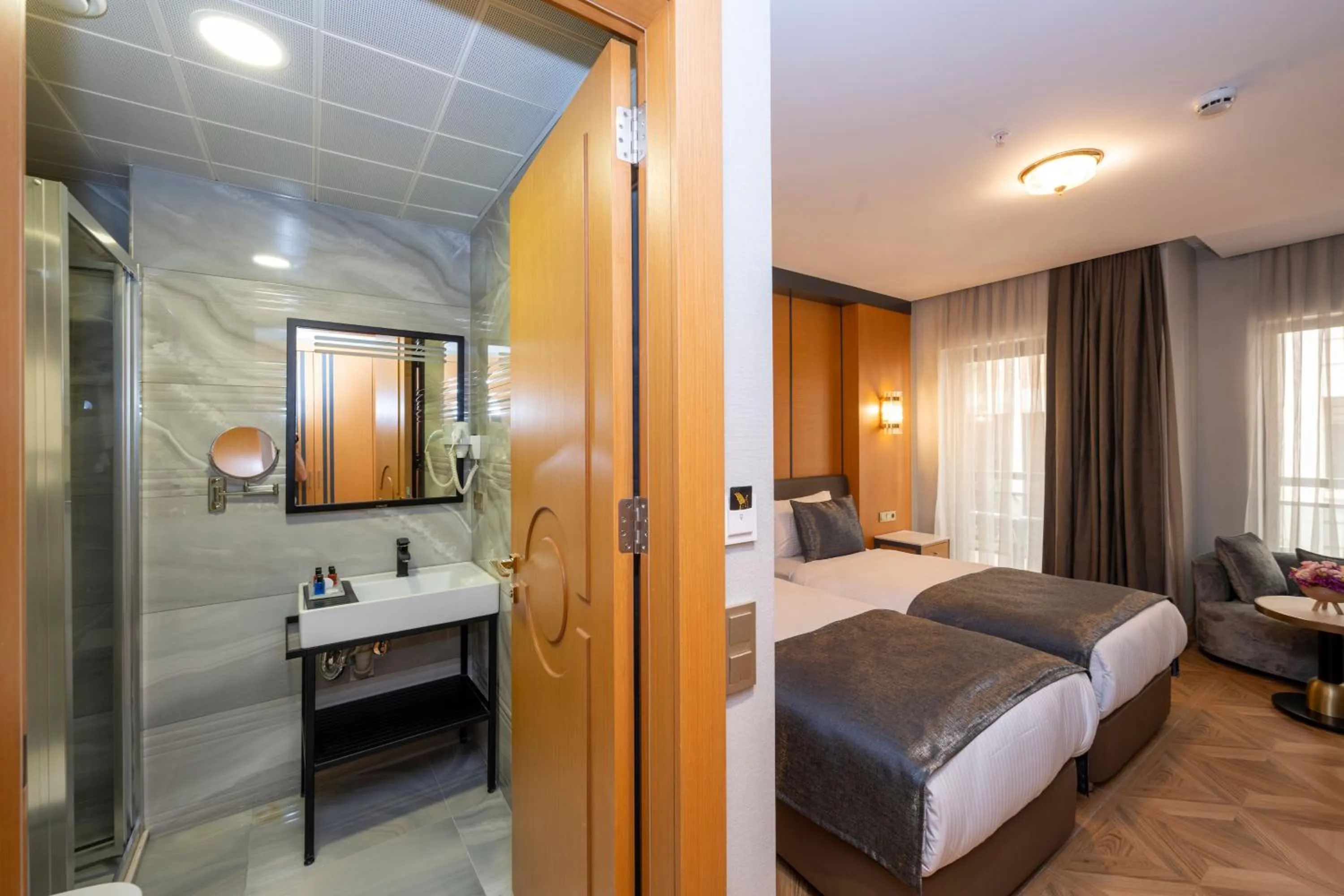 Bathroom, Bed in Freya Hotel