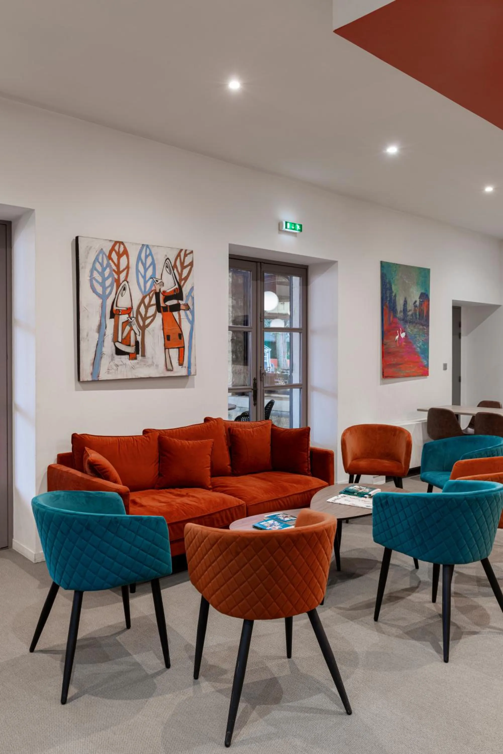 Lobby or reception in Logis Hotel-Restaurant Saint Romain