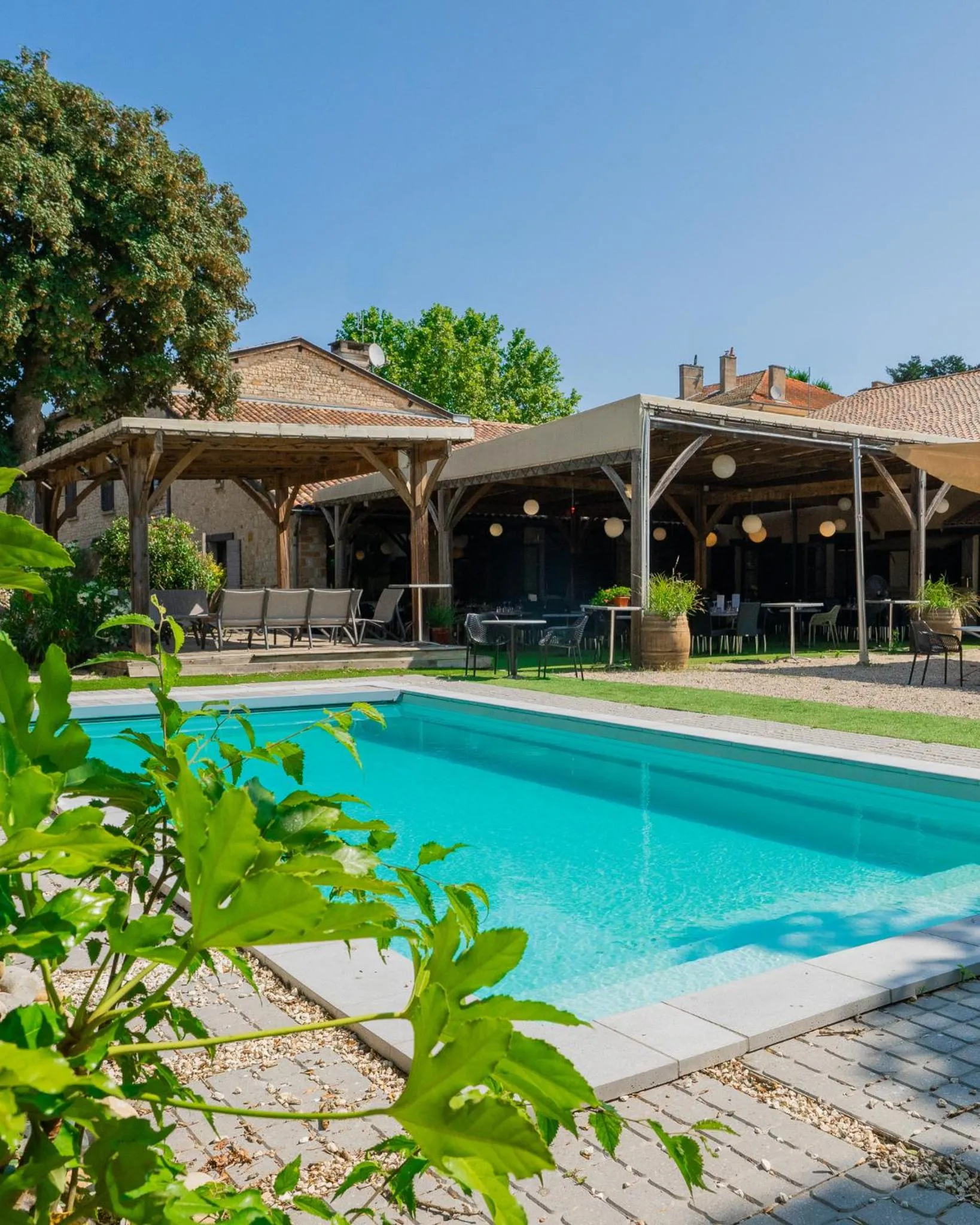 Swimming pool in Logis Hotel-Restaurant Saint Romain